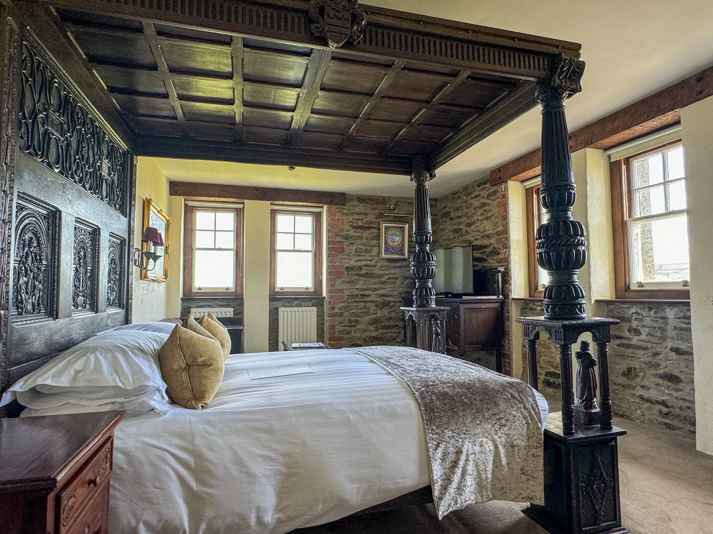 East Tower Junior Suite bedroom at Camelot Castle Hotel in Tintagel, Cornwall