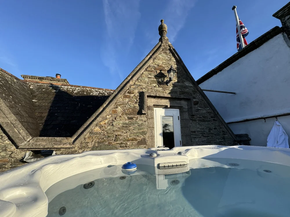 Best view from hot tub to room with flag.jpeg