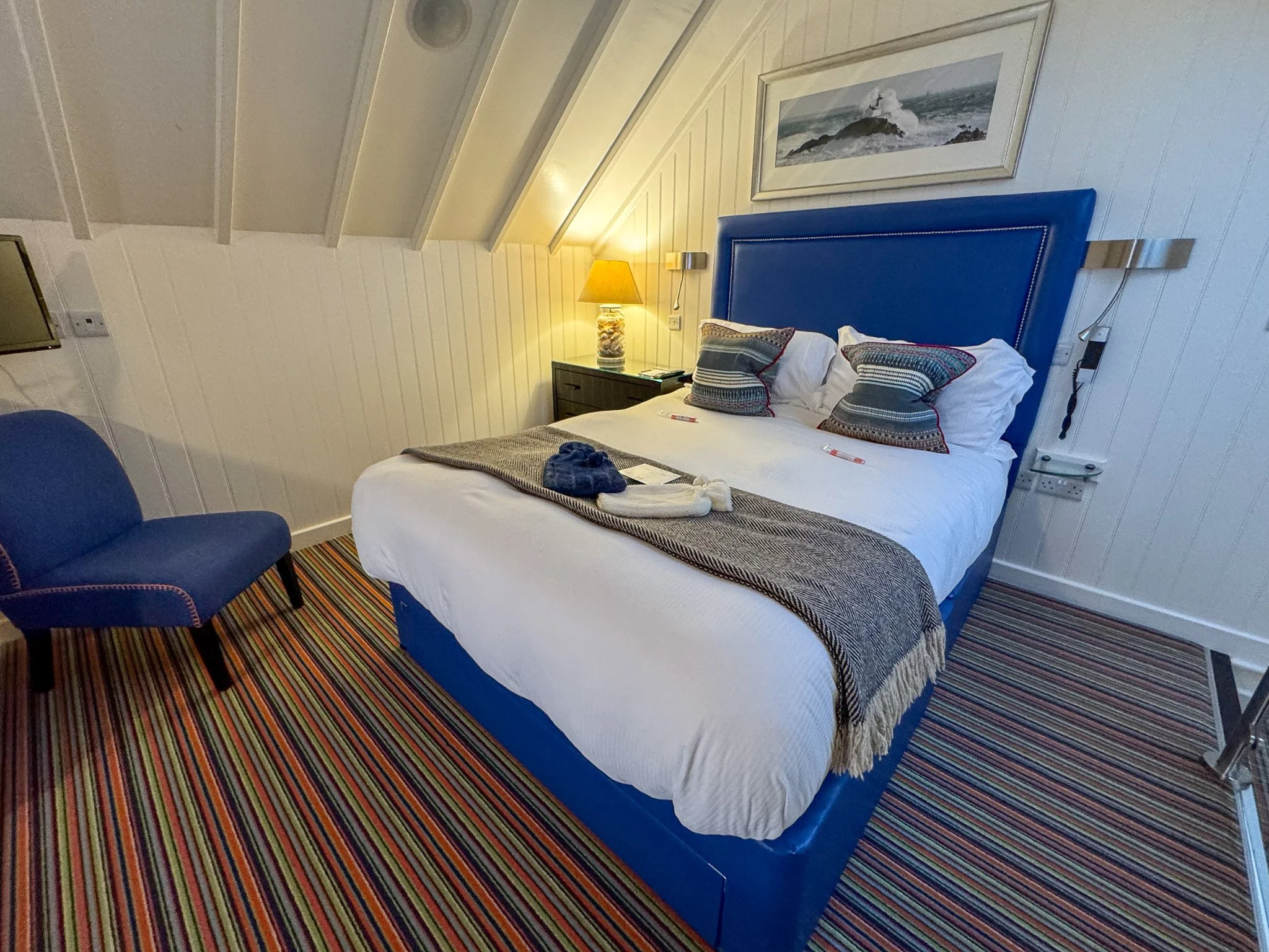 Bedroom inside a luxury beach hut at the Cary Arms Hotel & Spa in Torquay, Devon