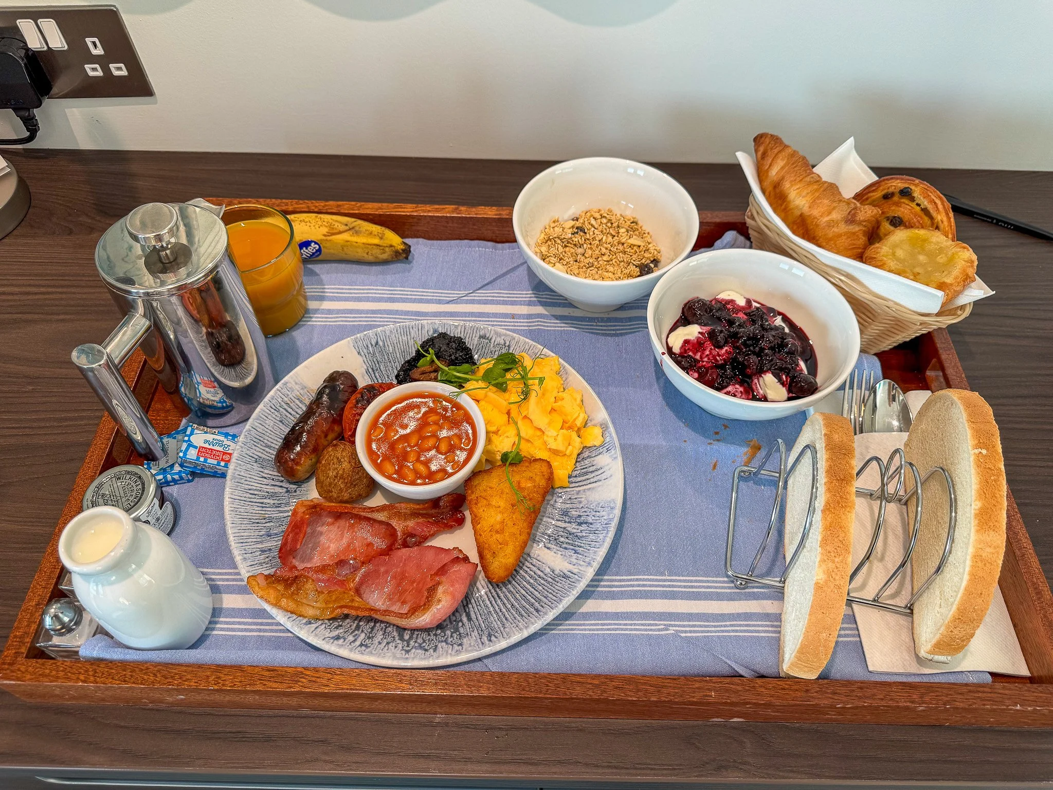 Hotel Indigo Torquay breakfast in room full English tray with pastries and coffee