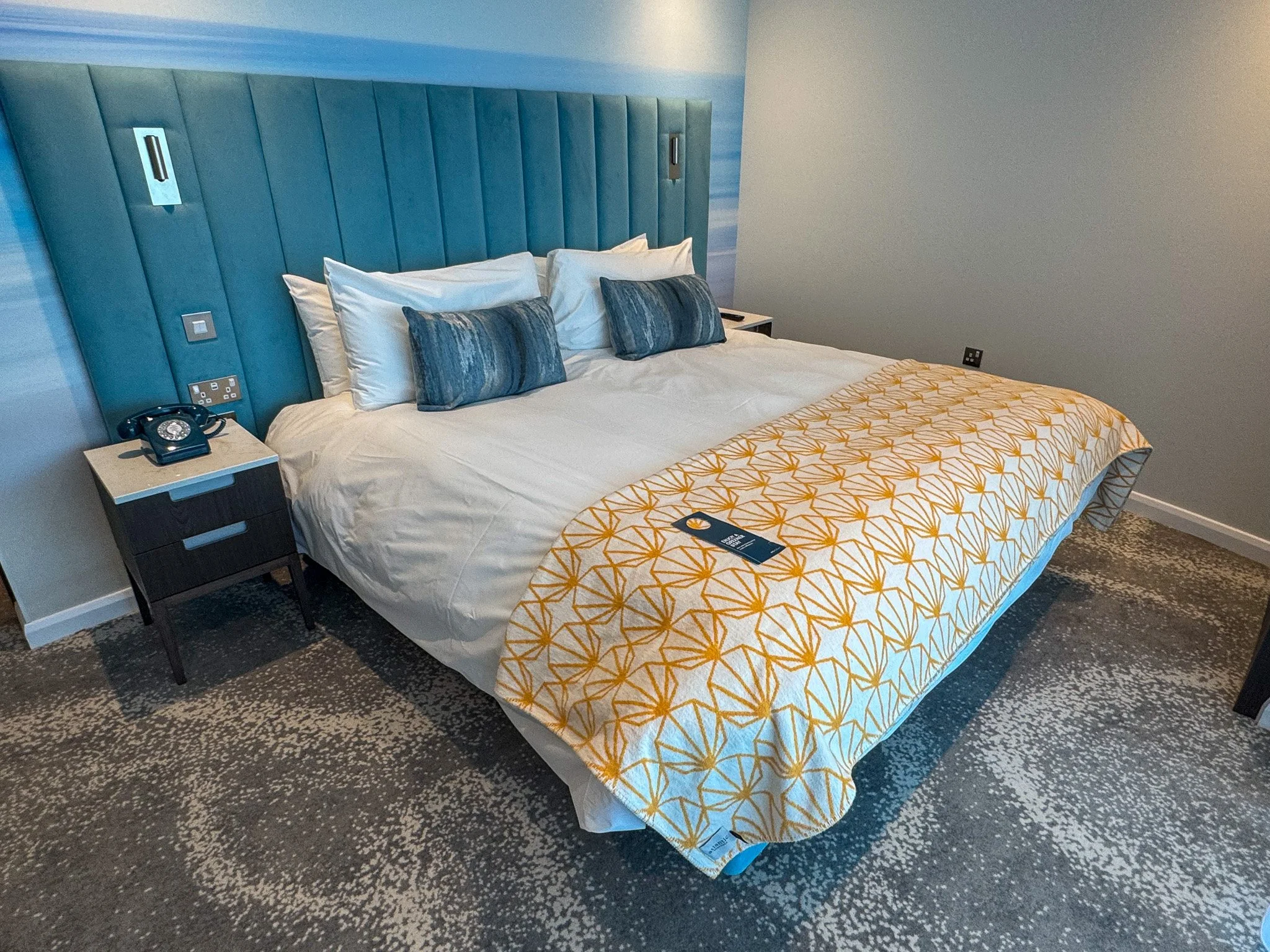 Hotel Indigo Torquay bedroom with modern boutique design and king size bed