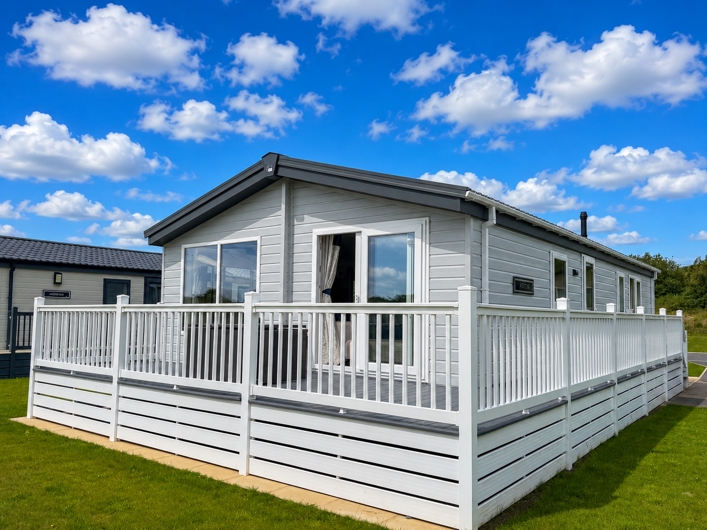 Exterior of a two-bedroom Platinum Lodge at Bodmin Holiday Park in Cornwall.