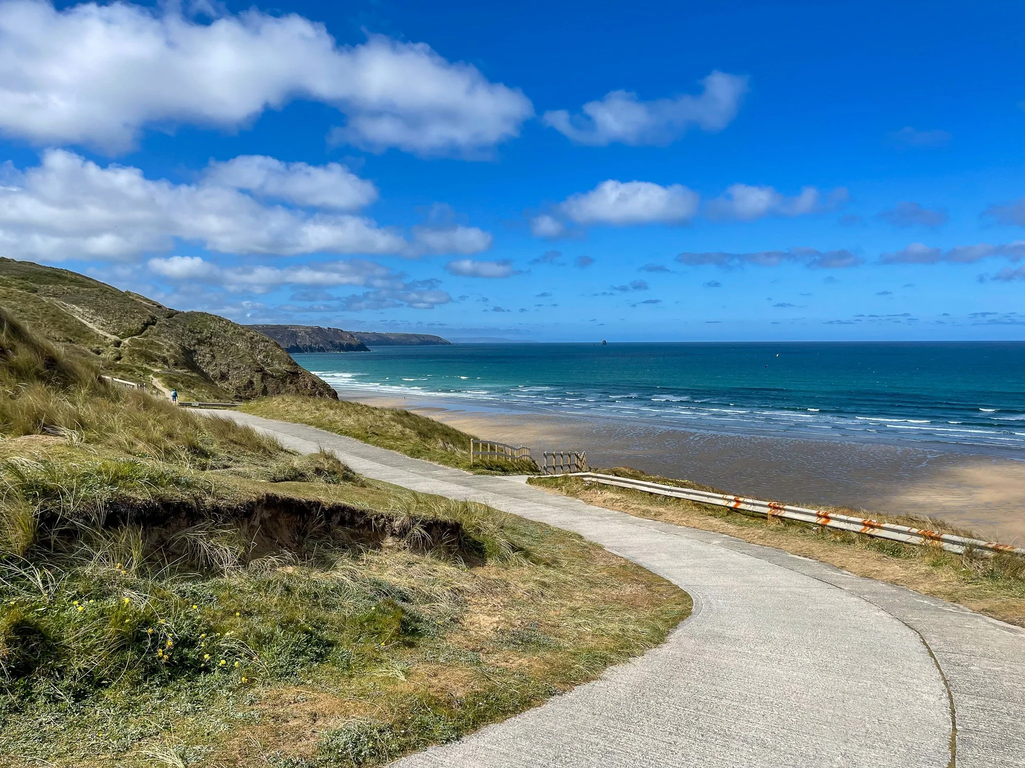 Perranporth Beach viewed from the path down from Perran Sands Holiday Park in Cornwall