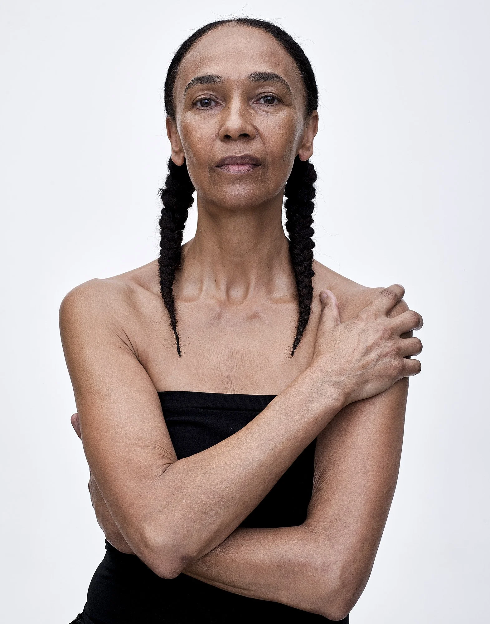 Unretouched skin portrait — strength and grace