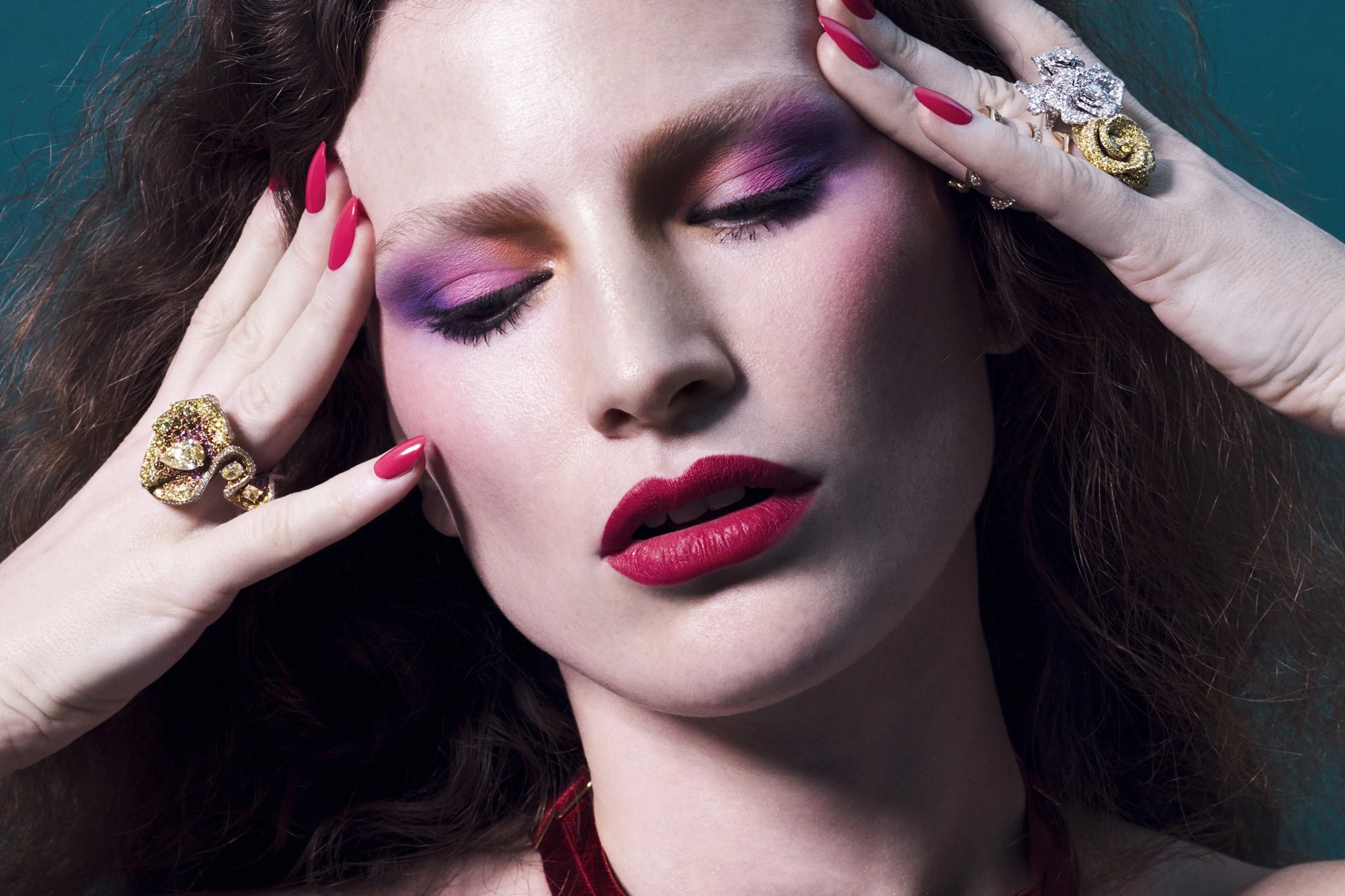 Jewellery editorial — rings and bold makeup