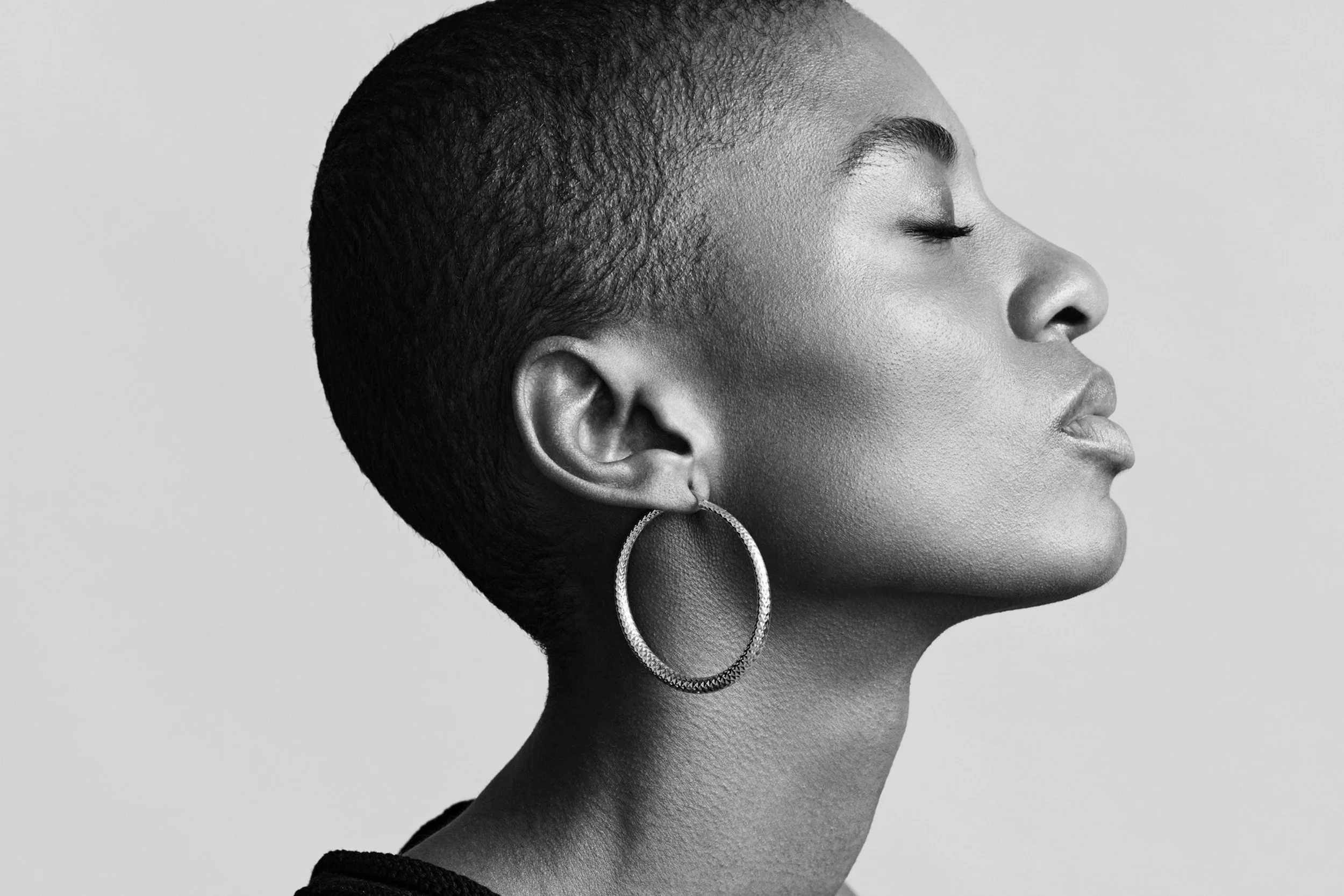 Luxury earring portrait — hoop earring profile