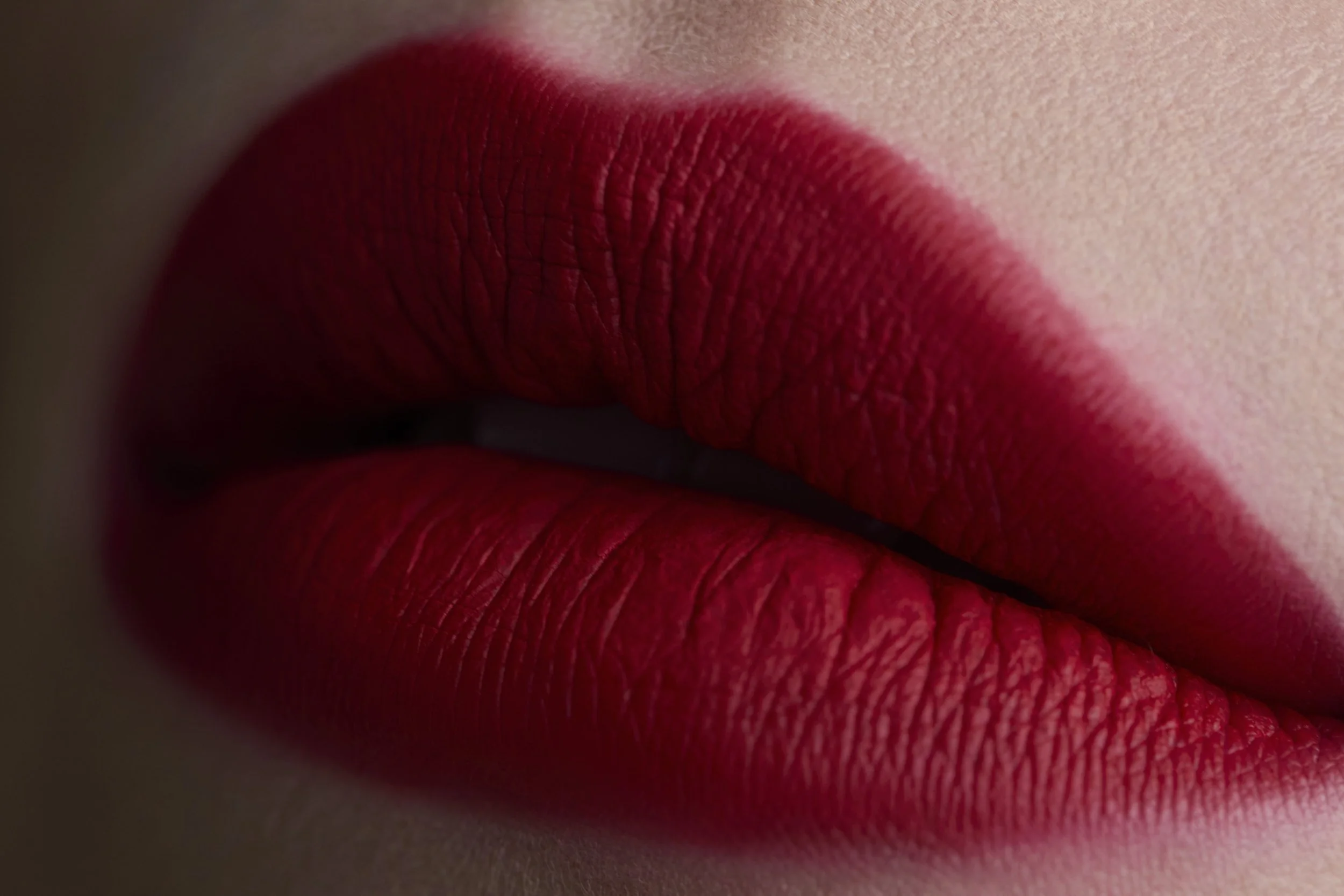 Red lips beauty close-up — cosmetics photography
