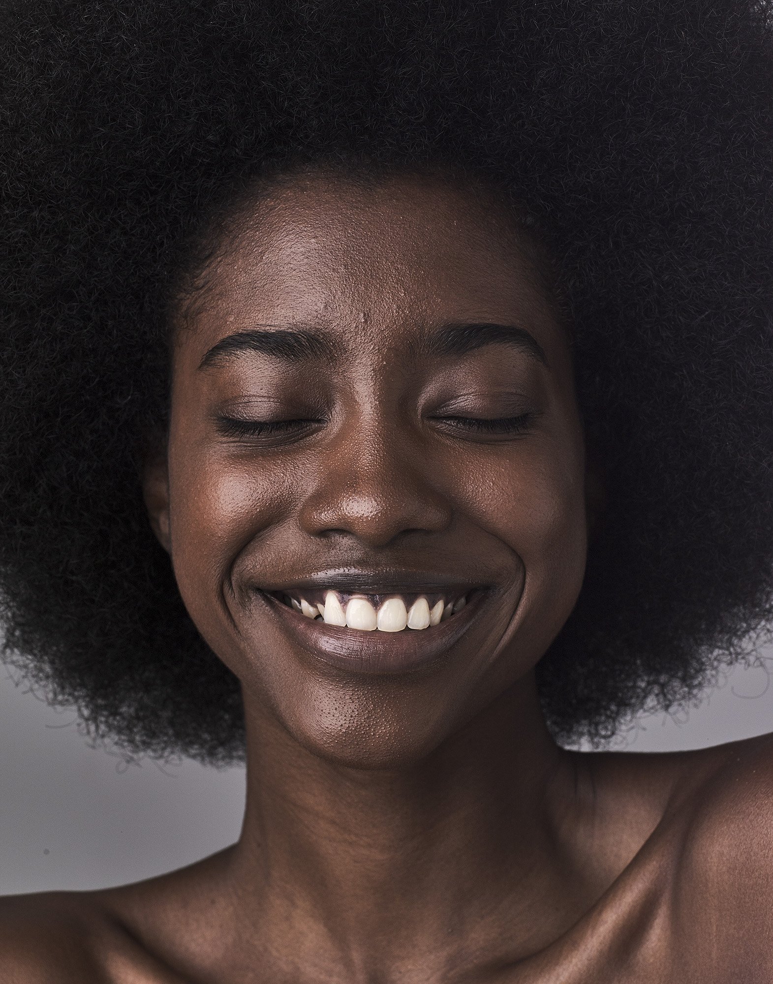 Unretouched beauty portrait — joy and natural skin