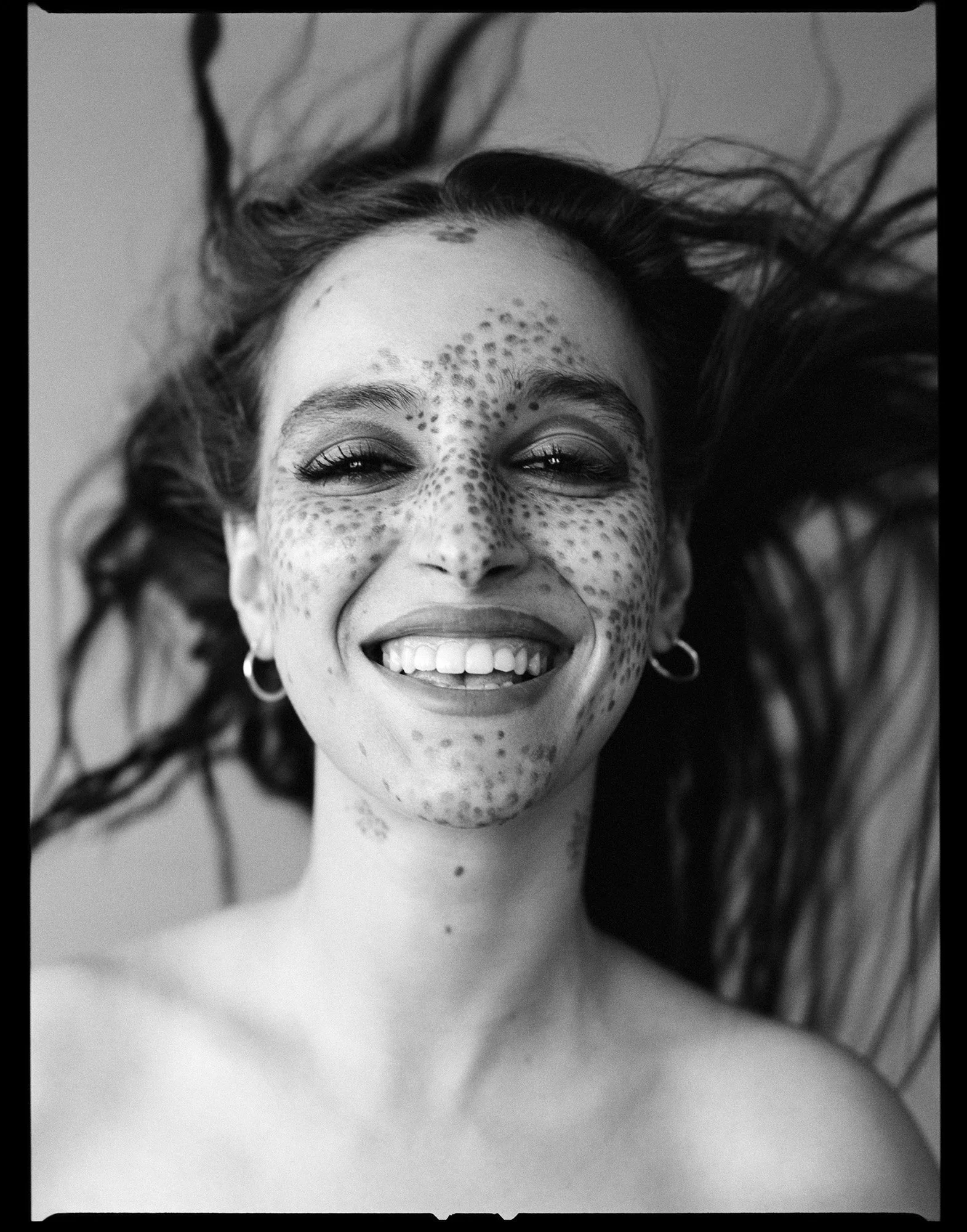 Unretouched portrait on film — freckles and movement