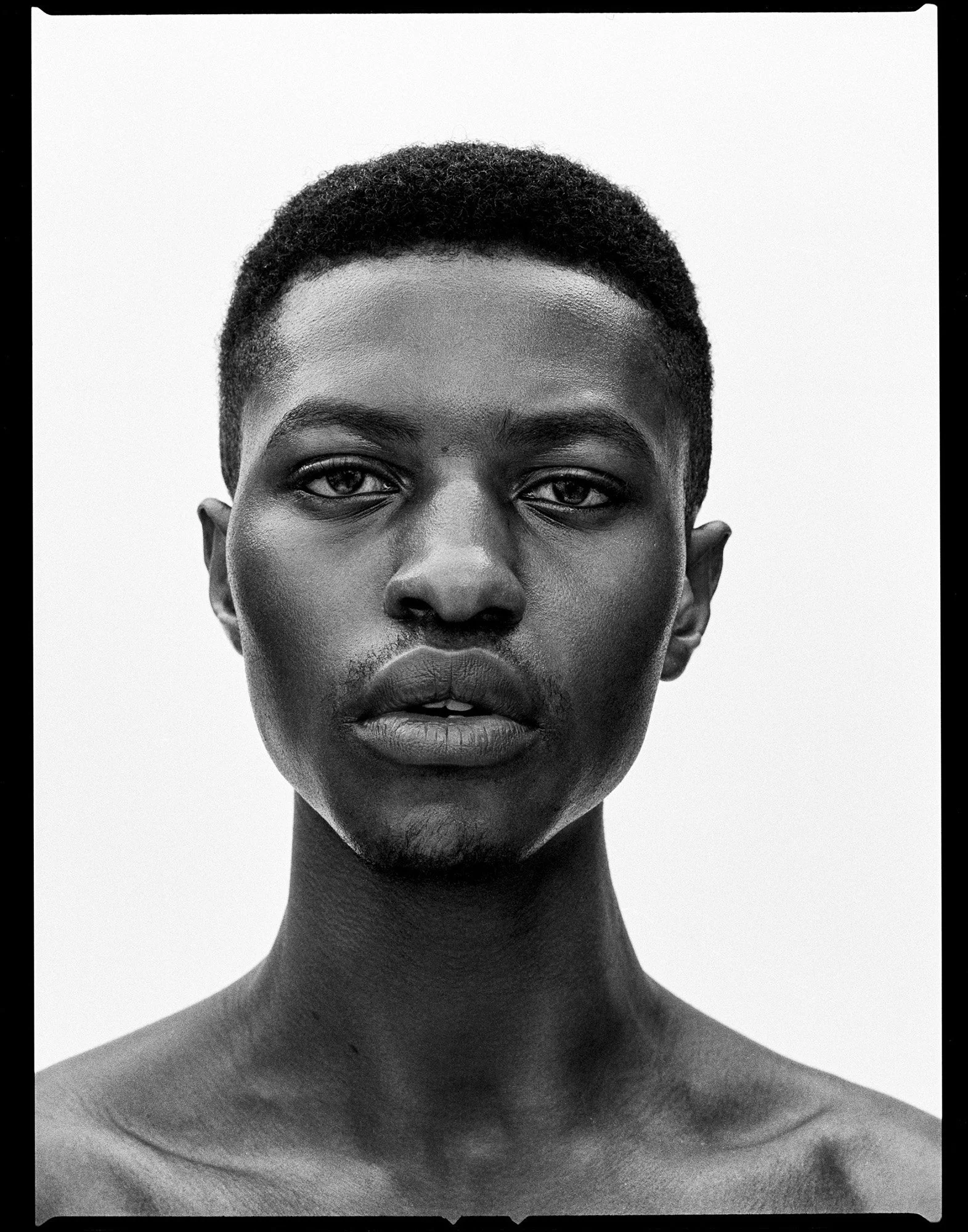 Unretouched male portrait on film — natural skin photography