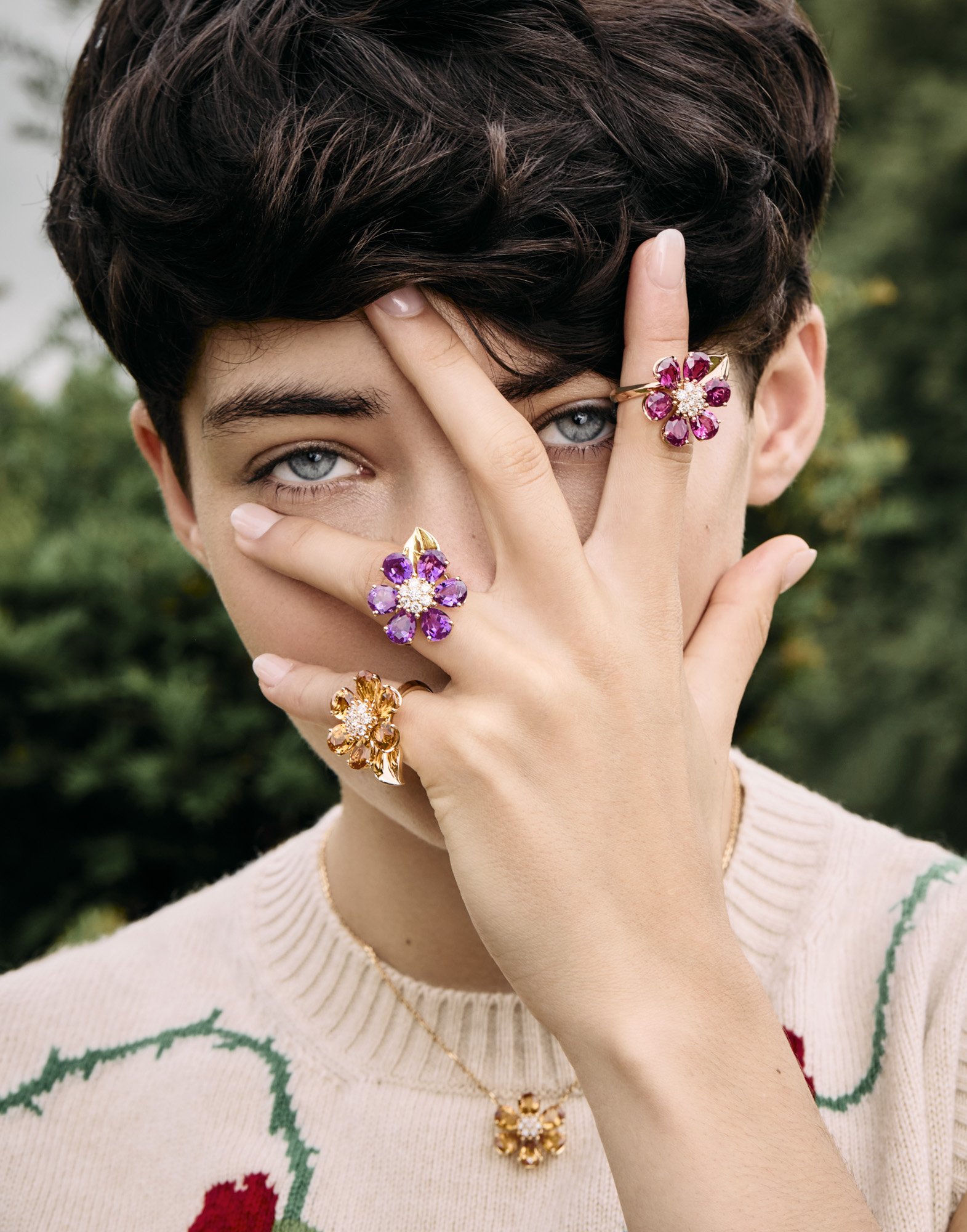 Flower rings and hand over the eye, jewellery photography London by Benjamin Kaufmann