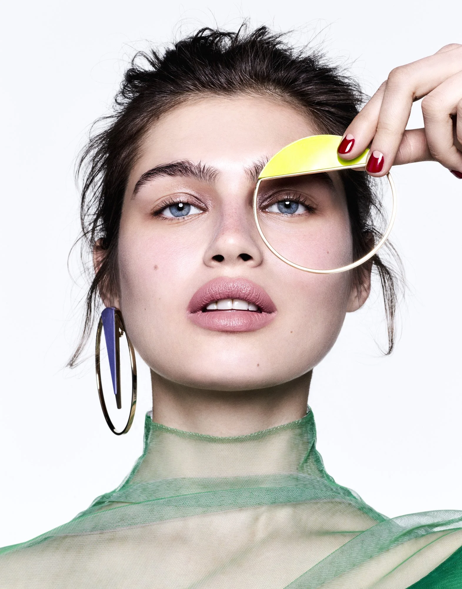 Statement hoop earring and a coloured lens, jewellery photographer London Benjamin Kaufmann