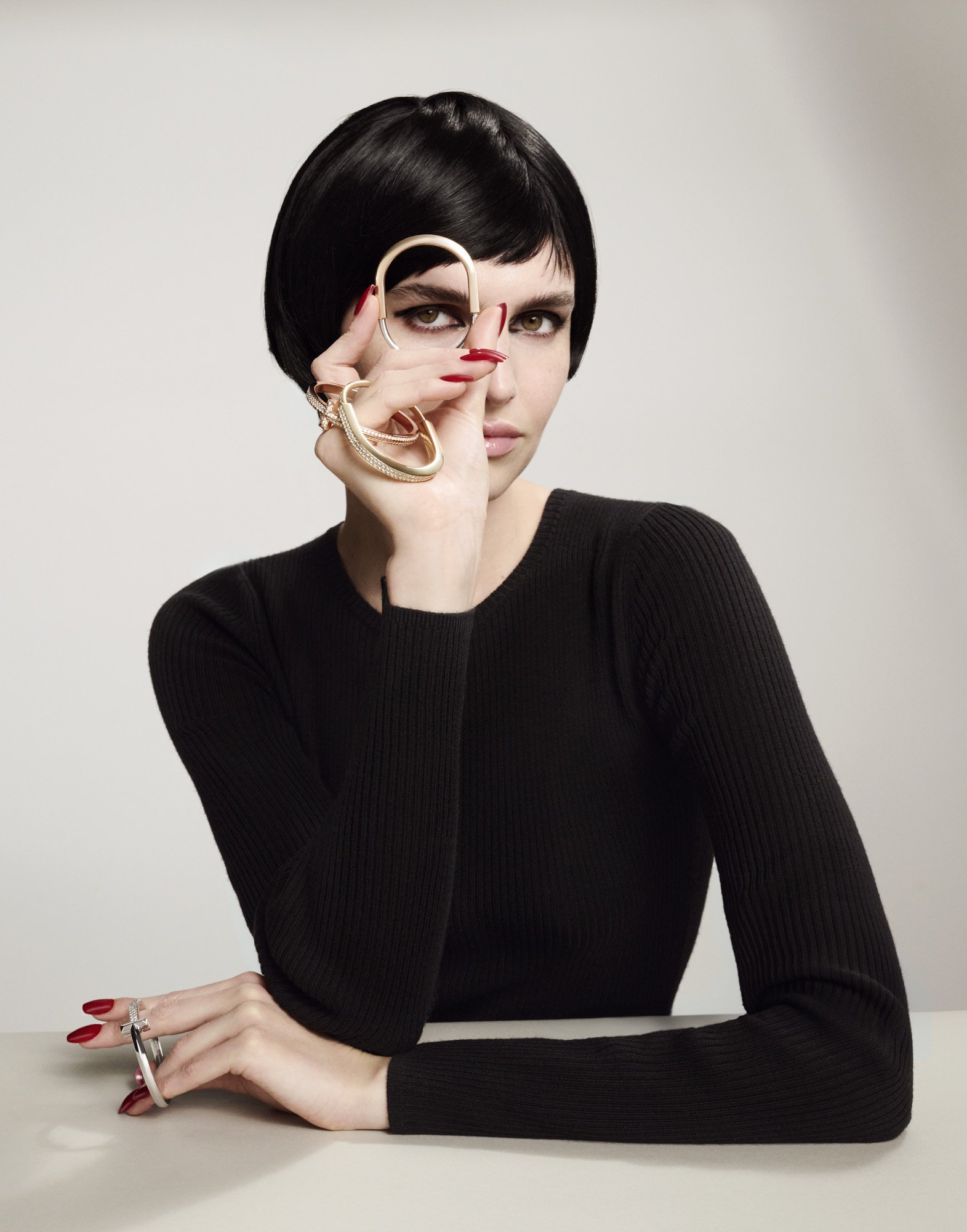 Sculptural white rings and a black bob, jewellery photography London by Benjamin Kaufmann