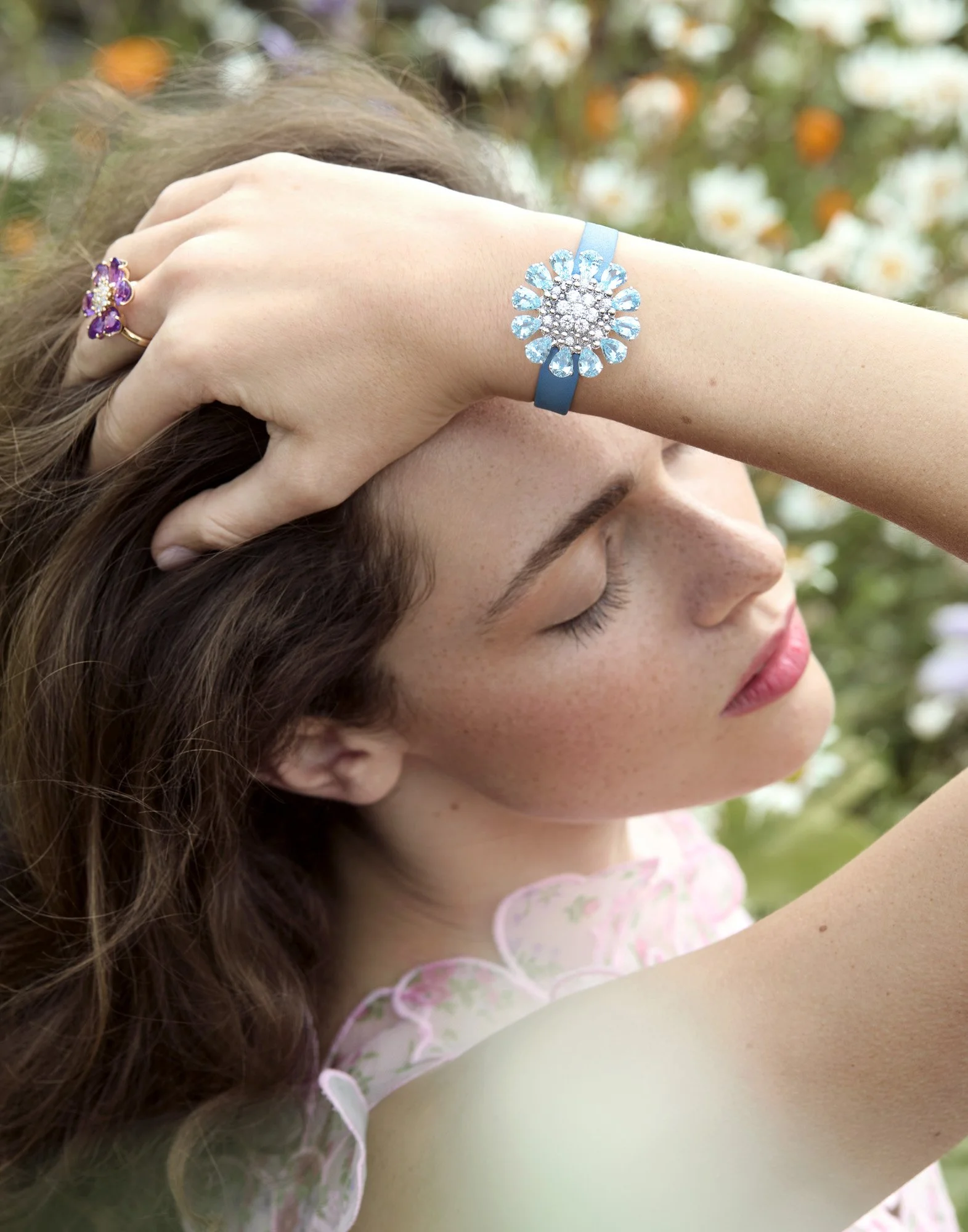 Blue jewelled watch in a summer garden, watch photography London by Benjamin Kaufmann