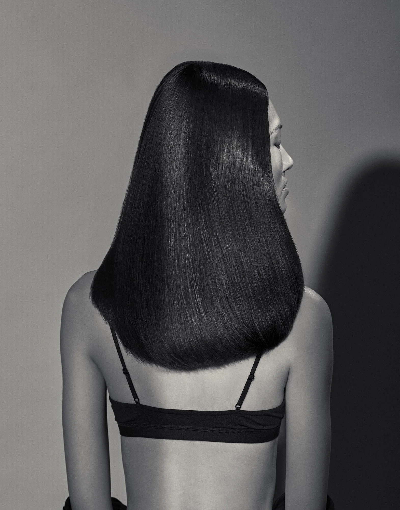 Sleek black hair from behind, black and white hair photography London by Benjamin Kaufmann