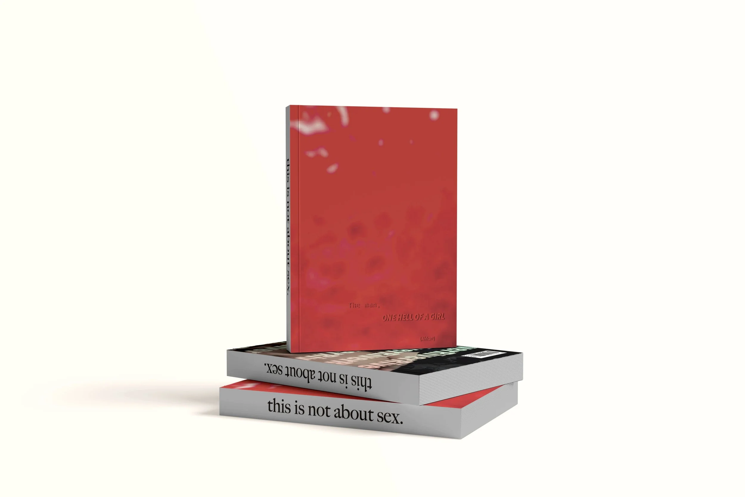 Debut novel One Hell of a Girl stacked on top of other copies.