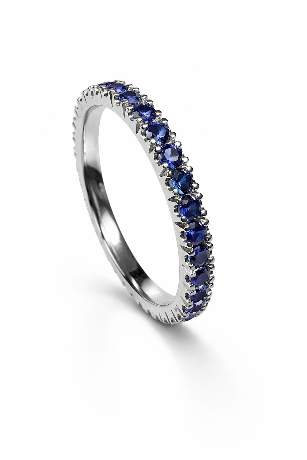 Handcrafted sterling silver 925 eternity ring with deep blue cubic zirconia
