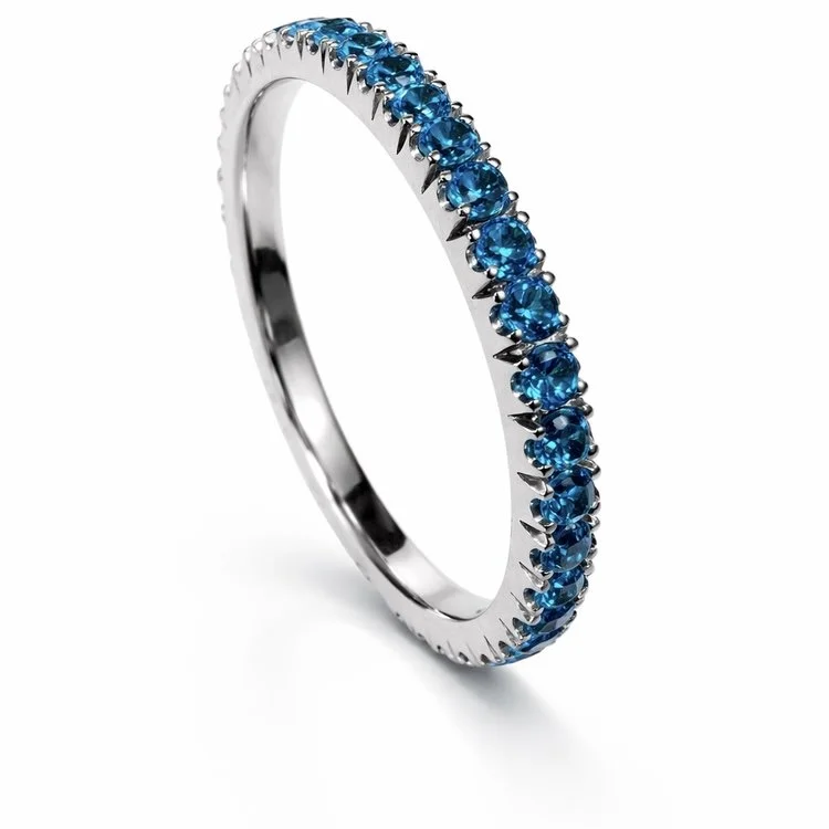 Sterling silver 925 eternity ring set with blue cubic zirconia stones