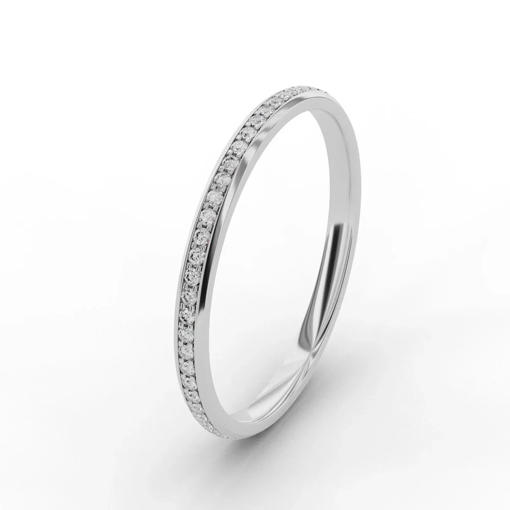 Thin diamond wedding band with micro claw setting and half eternity diamonds in white gold