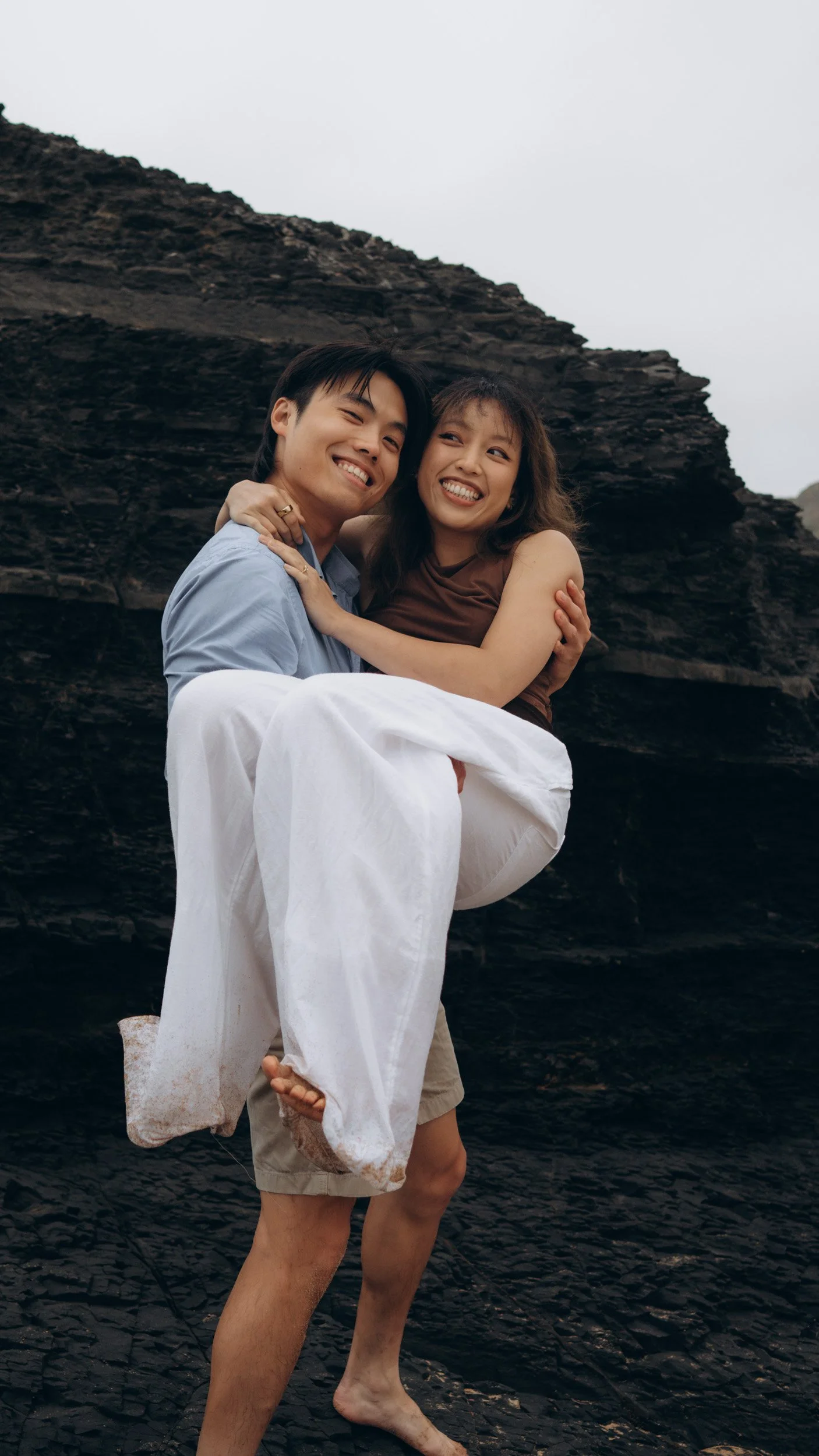 Joyful couple portrait following a proposal on the Algarve coast, representing emotional connection and natural lifestyle photography style.