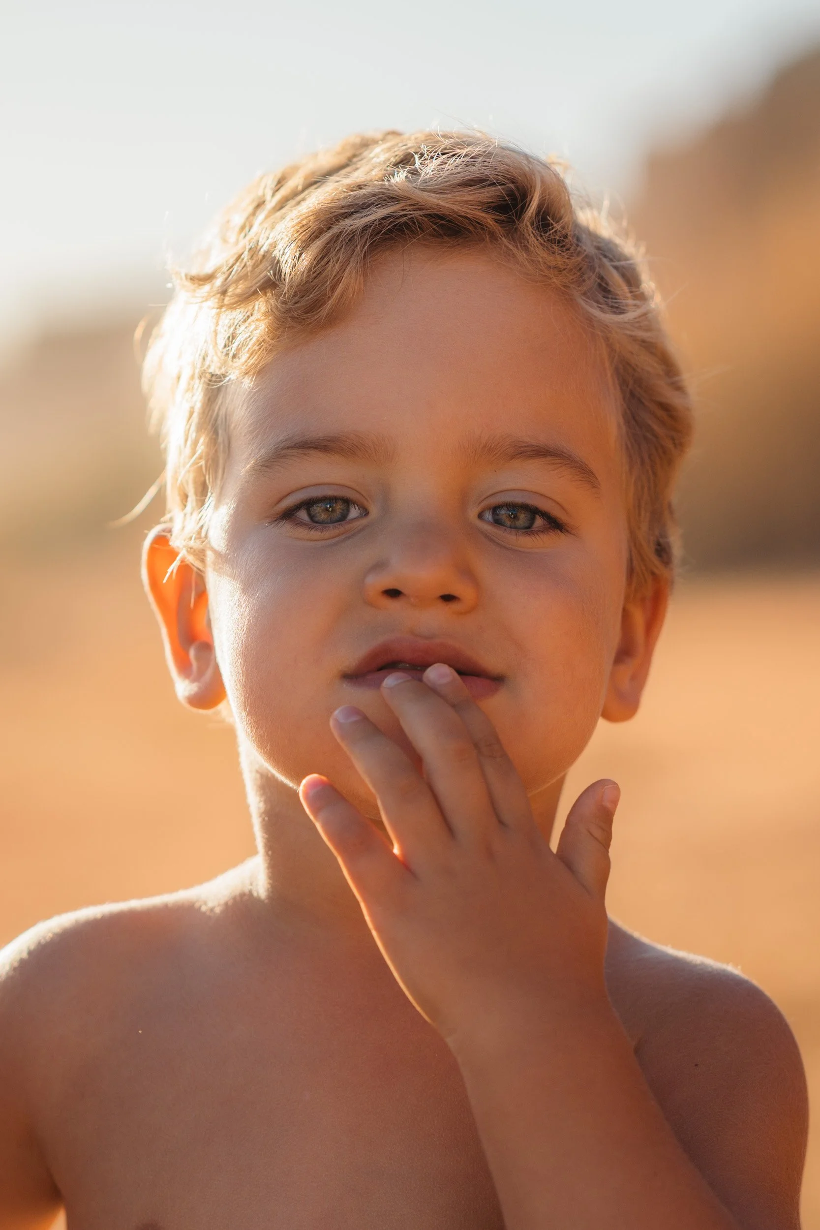 Child portrait during family photoshoot at Falésia beach Algarve Portugal