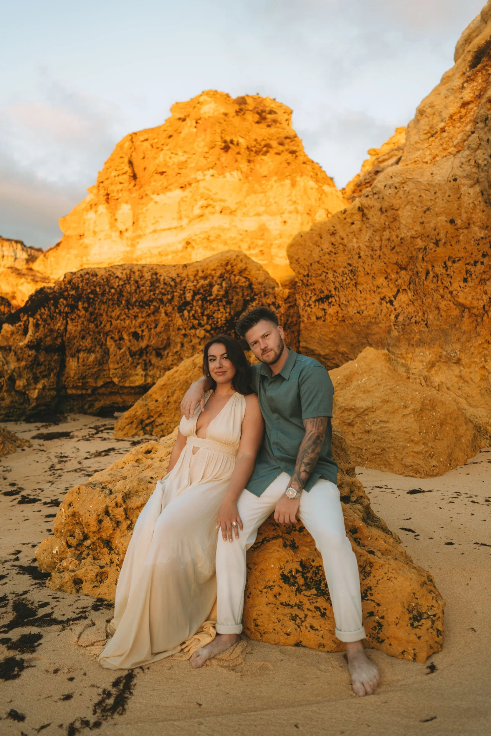 Engagement session at Praia da Marinha with natural candid moments captured at golden hour in Algarve.