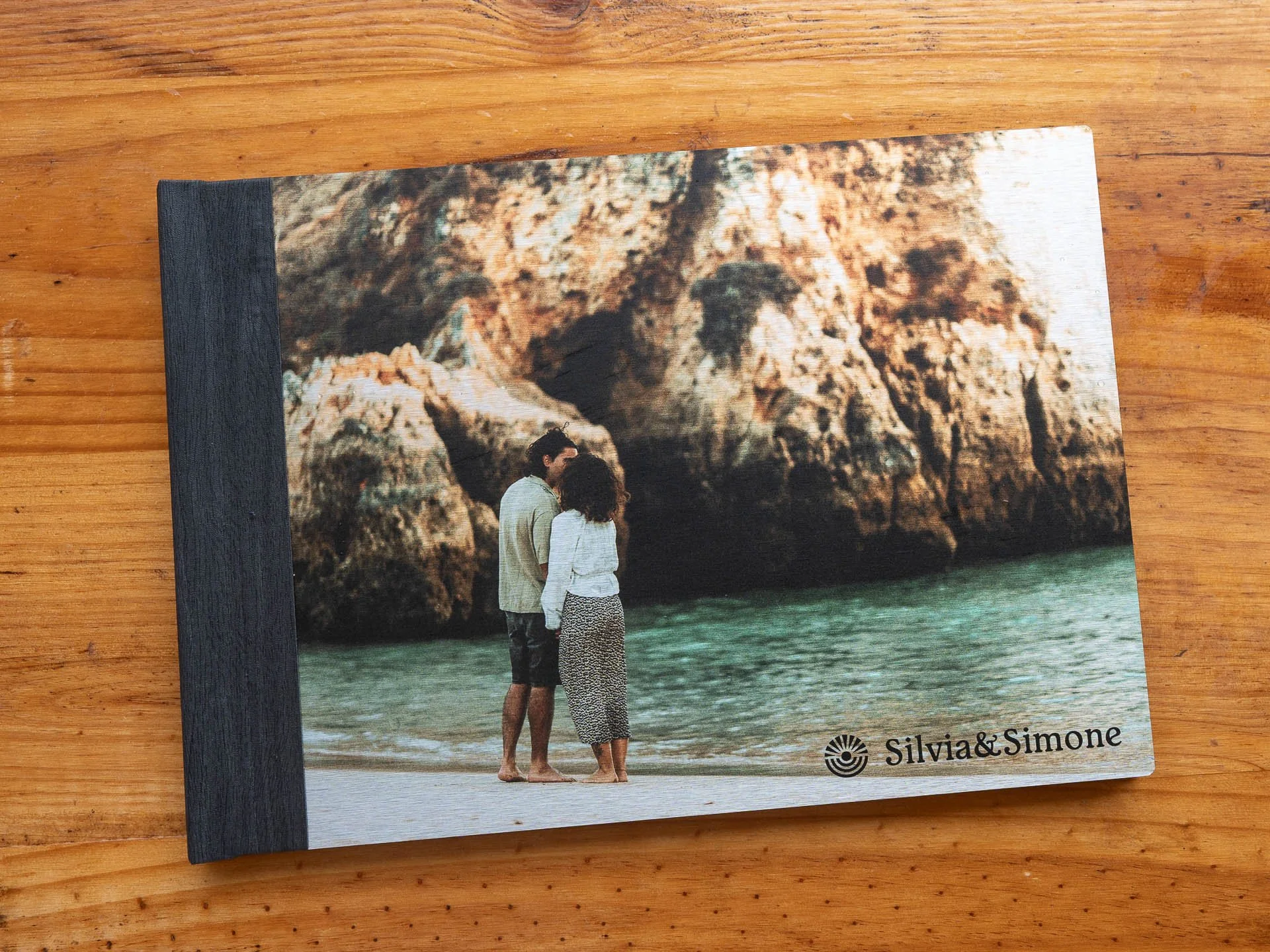 Premium lay-flat photo book with linen or aluminium cover, handcrafted in Europe.