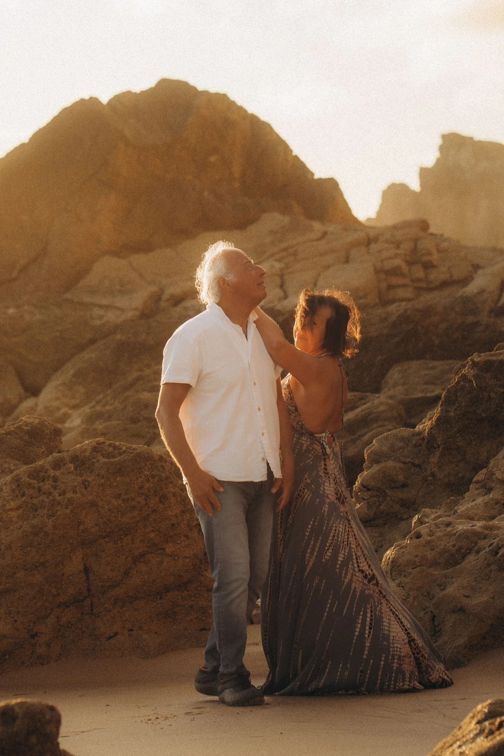 Intimate couple portrait at Praia do Tonel, Algarve, focused on real emotions and connection.