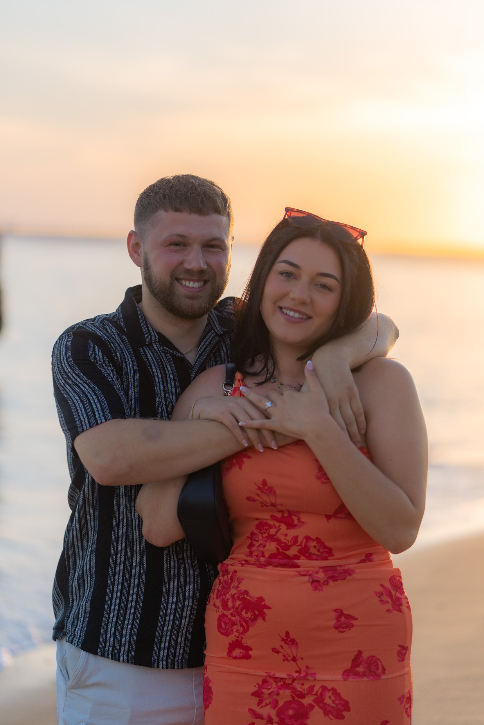Post-proposal portrait at Praia dos Três Irmãos. Soft golden light, relaxed energy and authentic connection captured moments after the engagement.