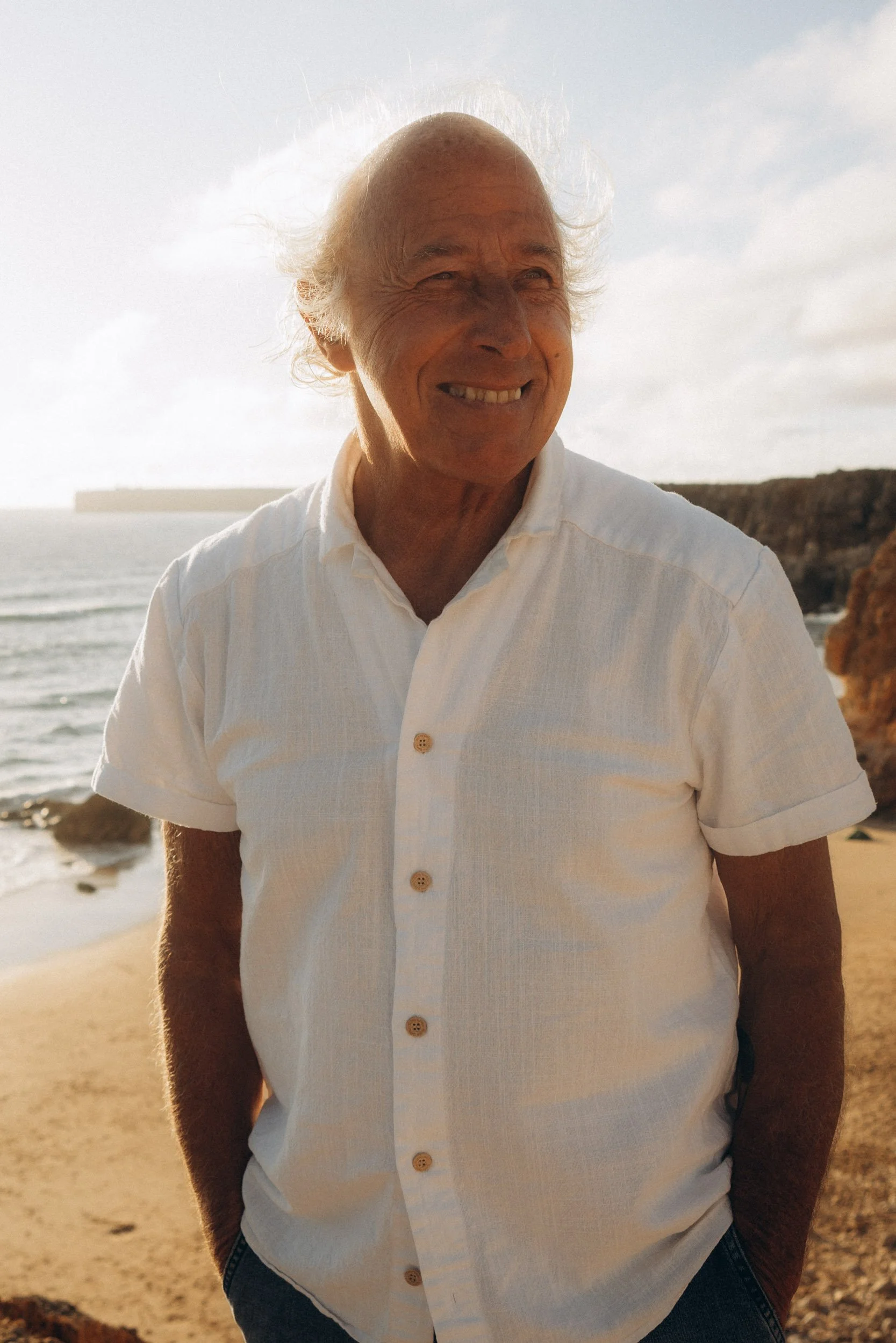 Portrait of a man during a couple photoshoot at Praia do Tonel, Algarve coast.