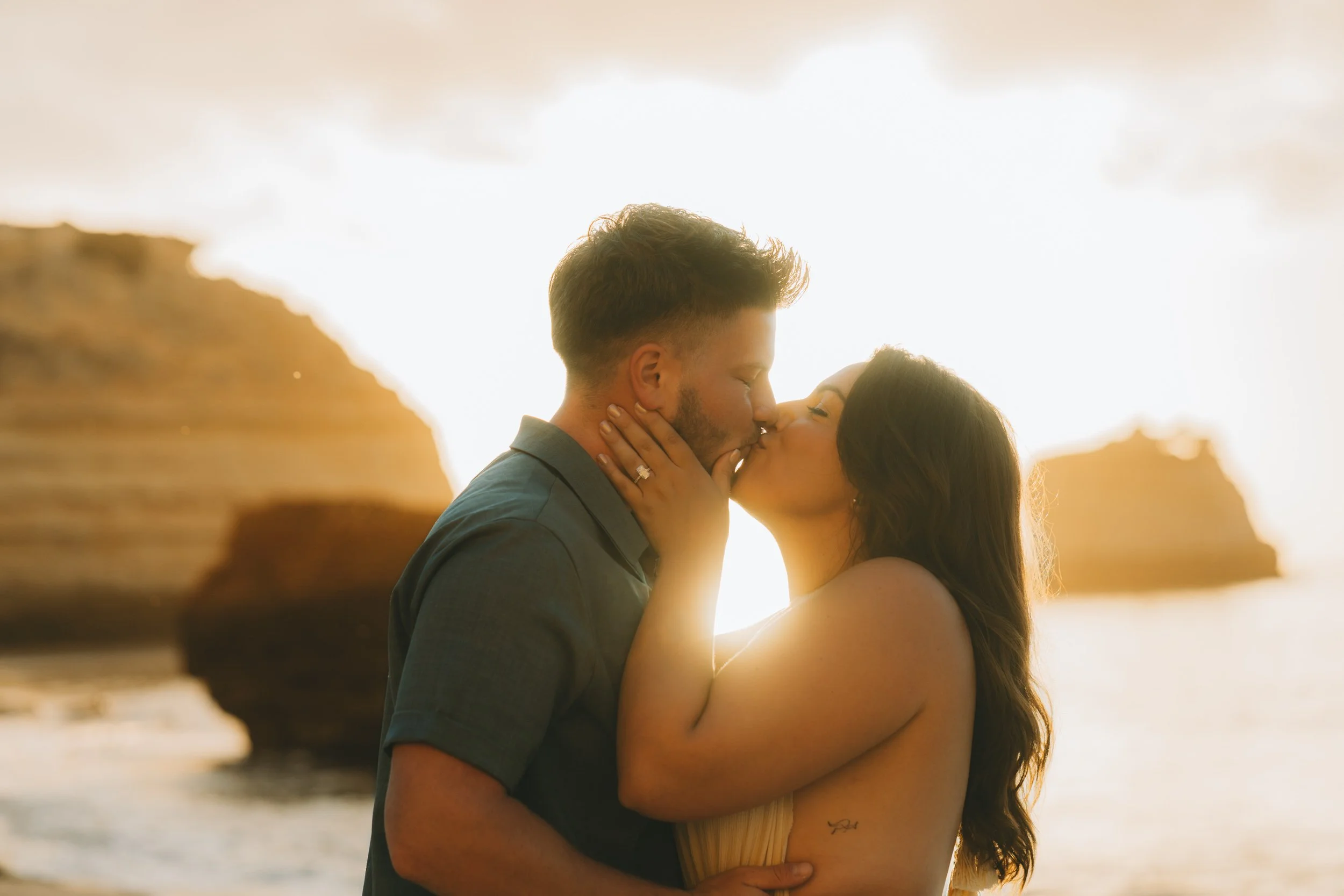 Detail shot of engagement ring during Praia da Marinha proposal photoshoot in the Algarve.