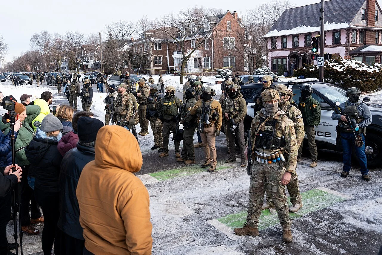 ICE agents and bystanders in Minneapolis after the January 07, 2026 shooting of Renée Good