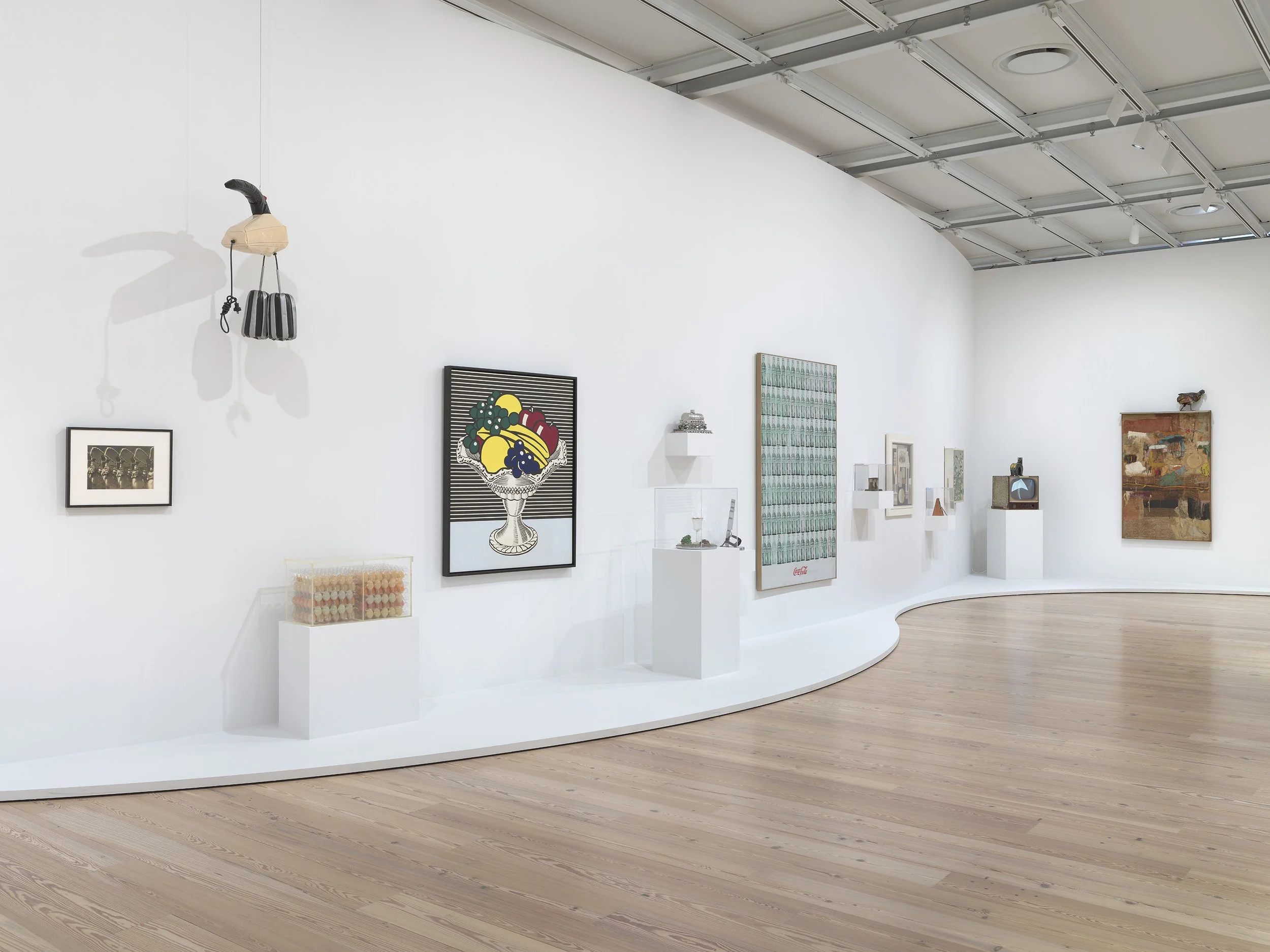 Installation view of  “Untitled” (America)  (Whitney Museum of American Art, New York, July 5, 2025-). From left to right: Margaret Bourke-White,  Edison Electric , 1930; Claes Oldenburg,  Soft Dormeyer Mixer , 1965; Robert Watts