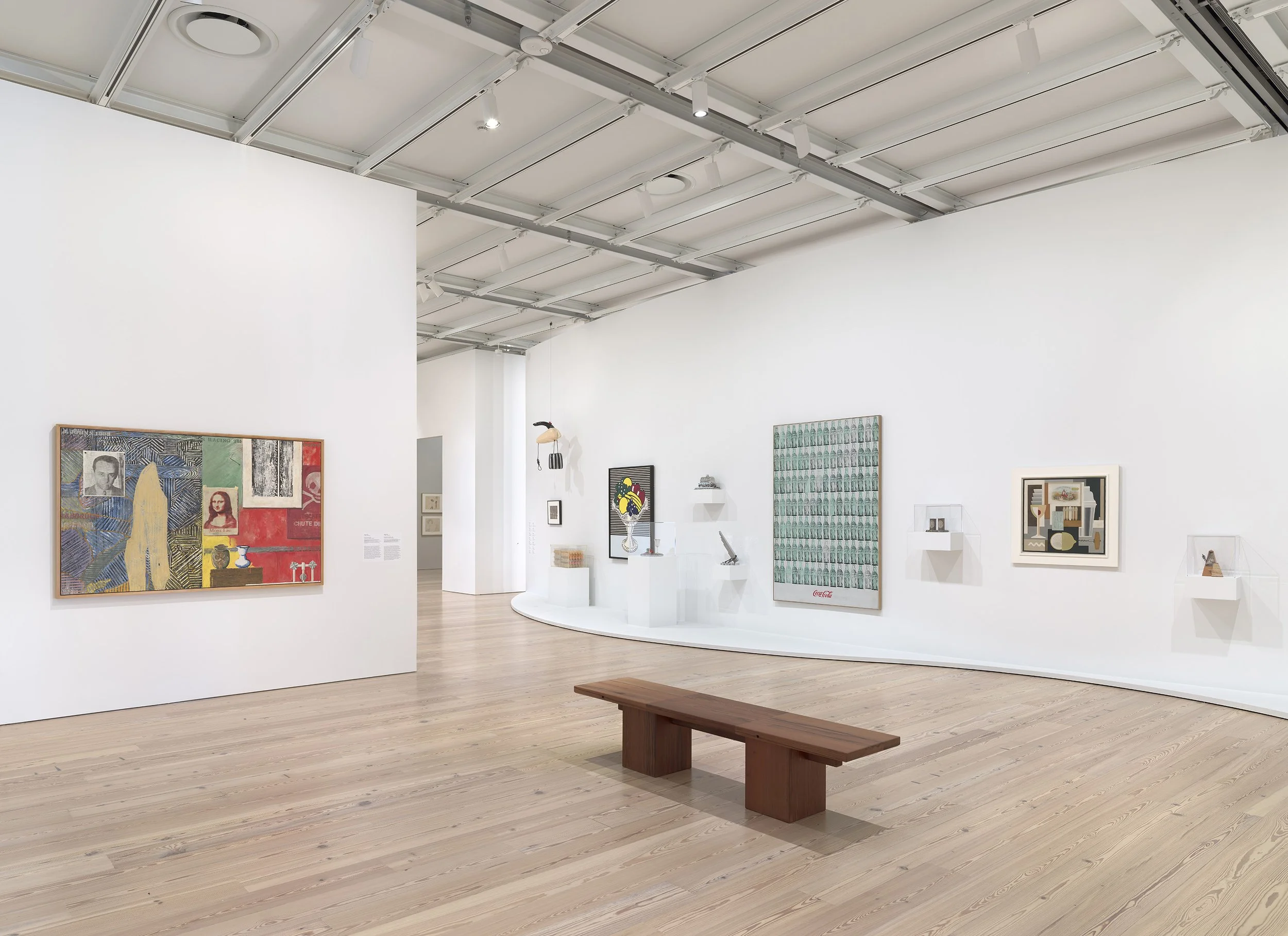 Installation view of  “Untitled” (America)  (Whitney Museum of American Art, New York, July 5, 2025-). From left to right: Jasper Johns,  Racing Thoughts , 1983; Claes Oldenburg,  Soft Dormeyer Mixer , 1965; Margaret Bourke-White