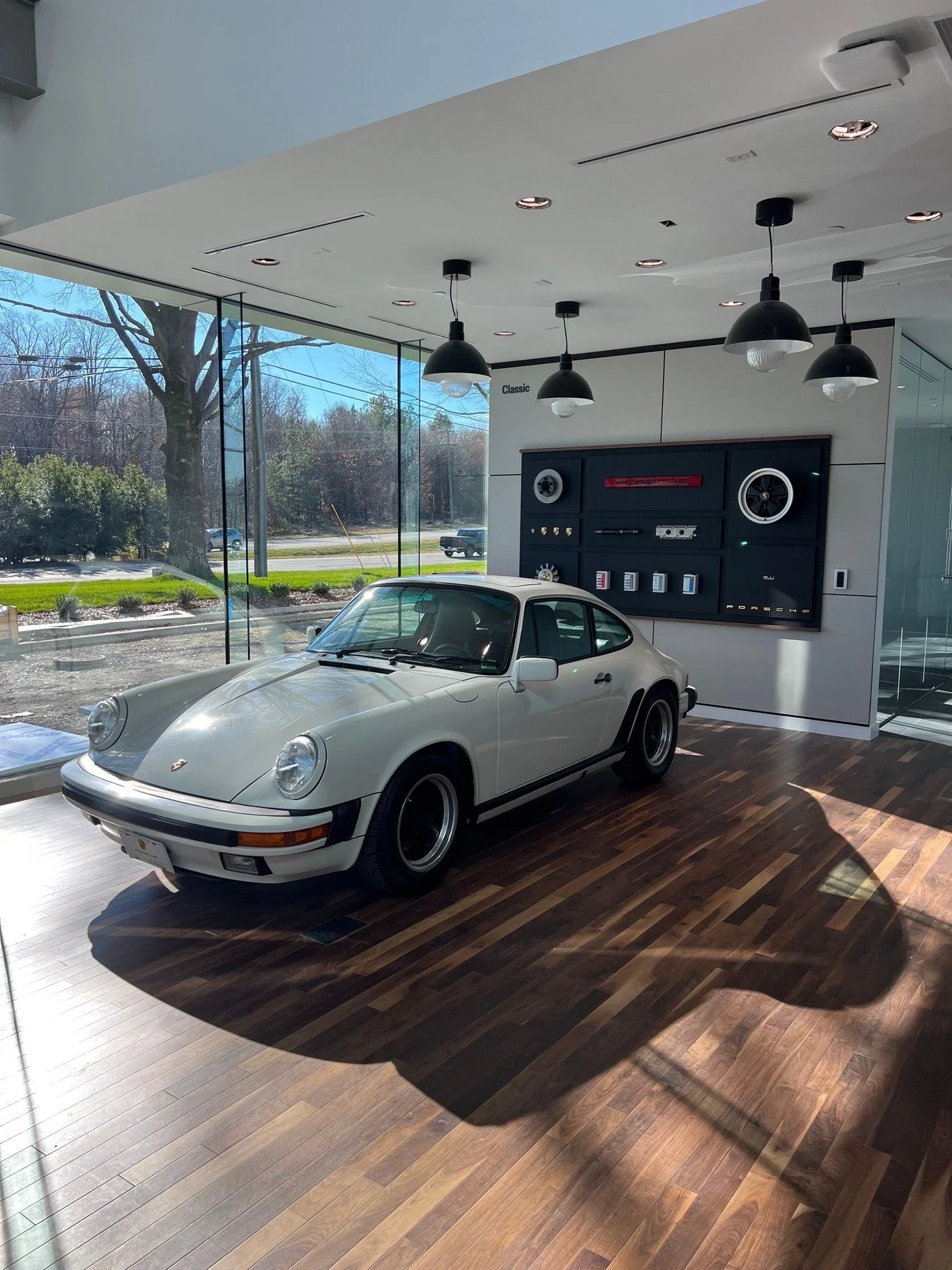 Final touches are underway just in time for the grand opening of our Porsche collaboration in Richmond! @euroclassics.porsche

#moderndesign #customresidences #designexcellence #architecturalaesthetics #creativesolutions #architecturalinnovation #cli
