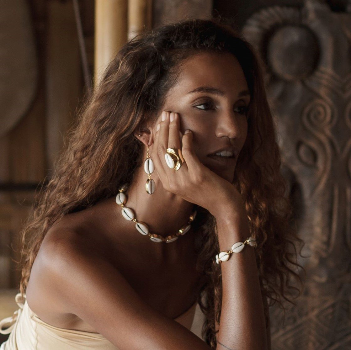 Ethical gold cocktail ring with cowrie shell handmade in Bali