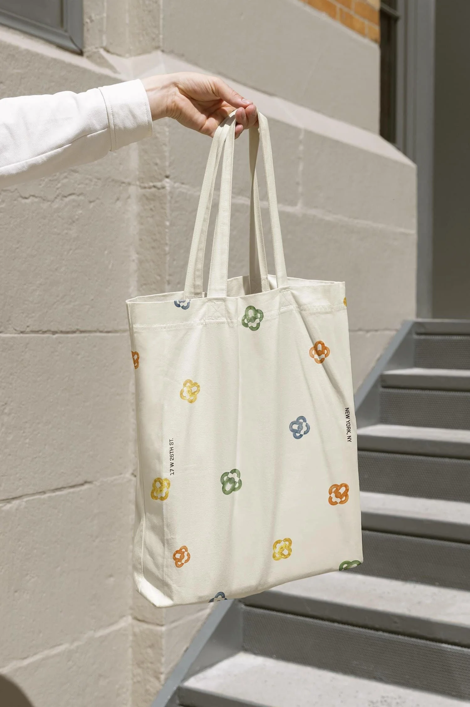 Cream tote bag with colorful floral patterns and minimalist branding | The Morris Project
