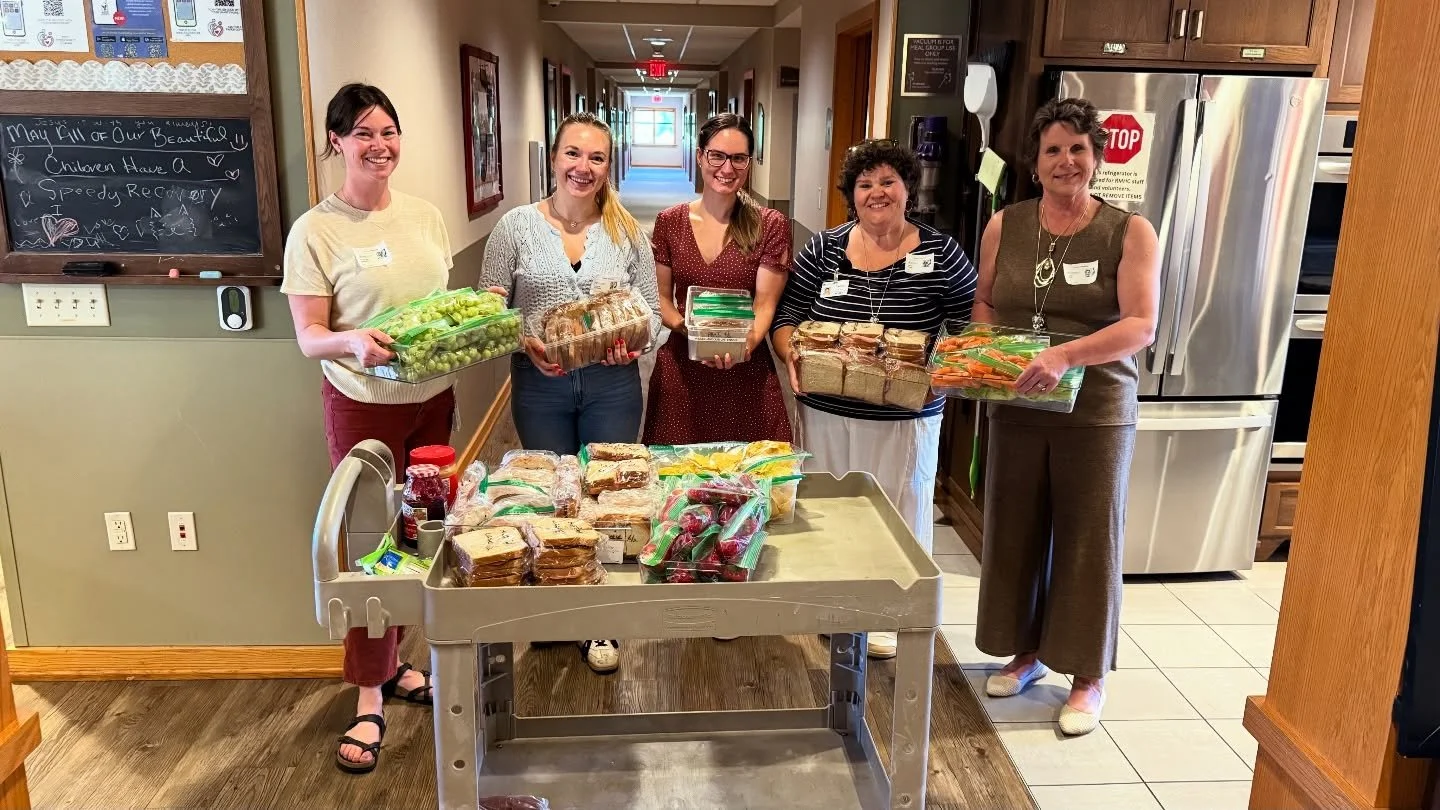 Today members of the lab and the radiology social committee volunteered at @rmhcmilwaukee making and packing up lunches 🥪 It was the best time spent together!