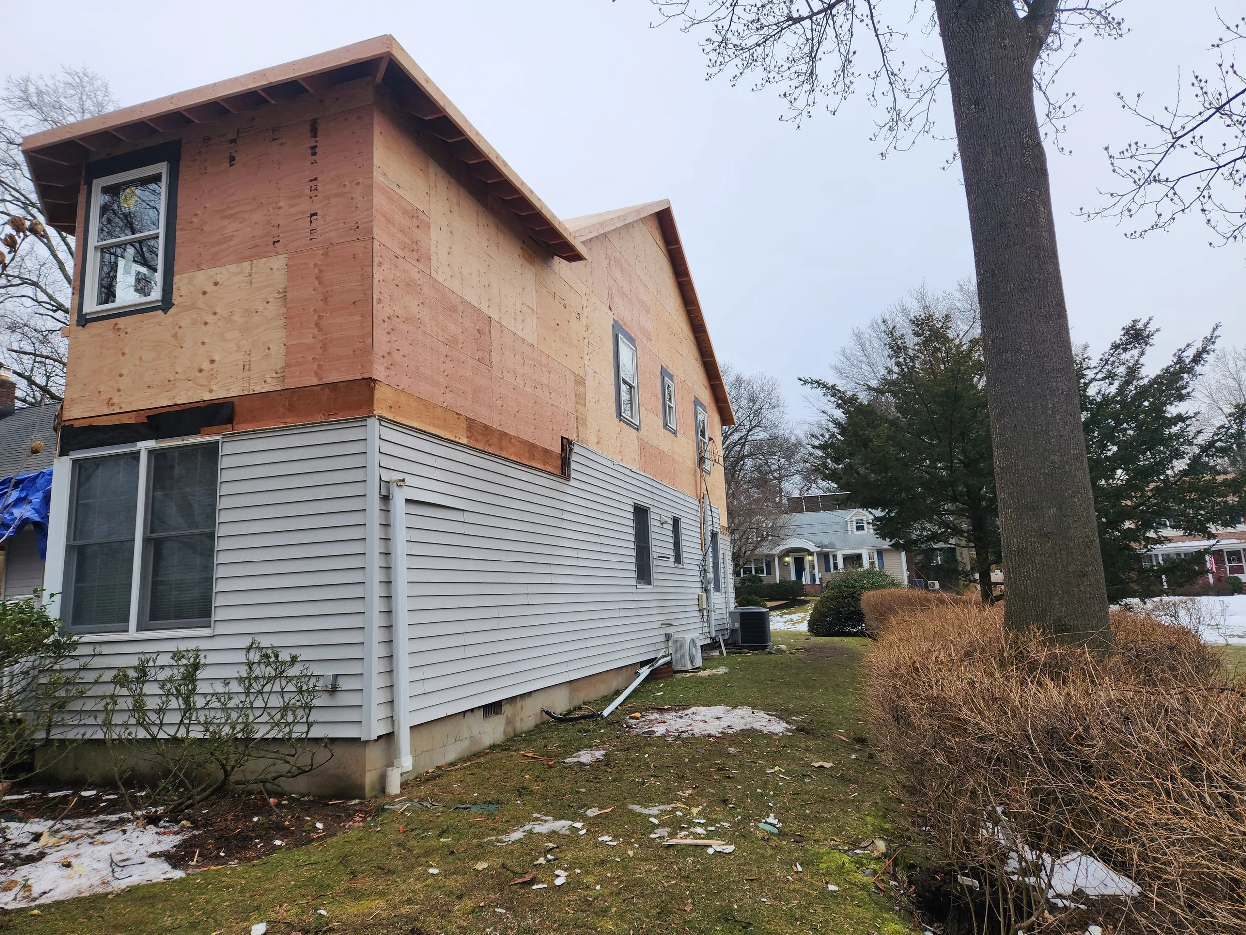 Project  1007 - Addition Side Yard View - Progress.jpg