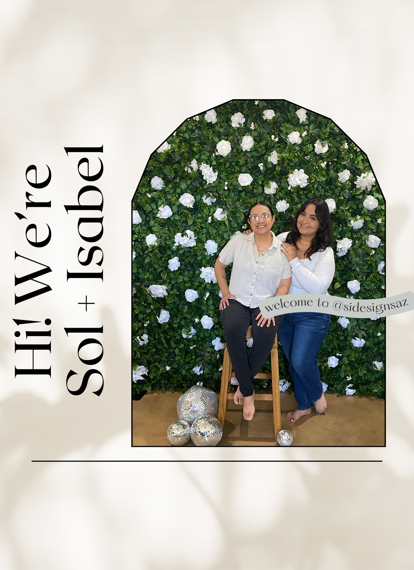 The married founders of our handmade crochet and stationery shop smiling together at our launch event with disco balls and floral backdrop