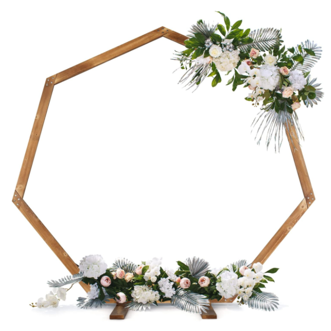 Wooden hexagonal frame decorated with white and pale pink flowers and green foliage at the top right and bottom left.