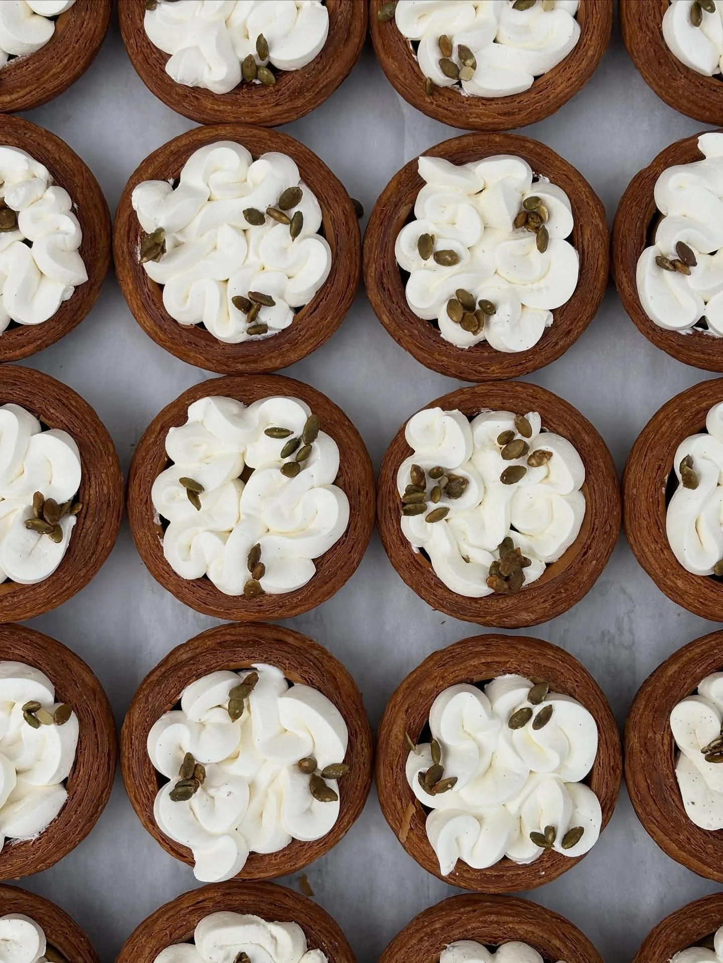 PUMPKIN CHEESECAKE CROISSANT

A mini version of our Thanksgiving pie: Spiced pumpkin cheesecake, crispy croissant shell, vanilla specked whipped cream and candied pumpkin seeds. 

Missed out on pie preorders? Come get it every Friday - Saturday, 10am