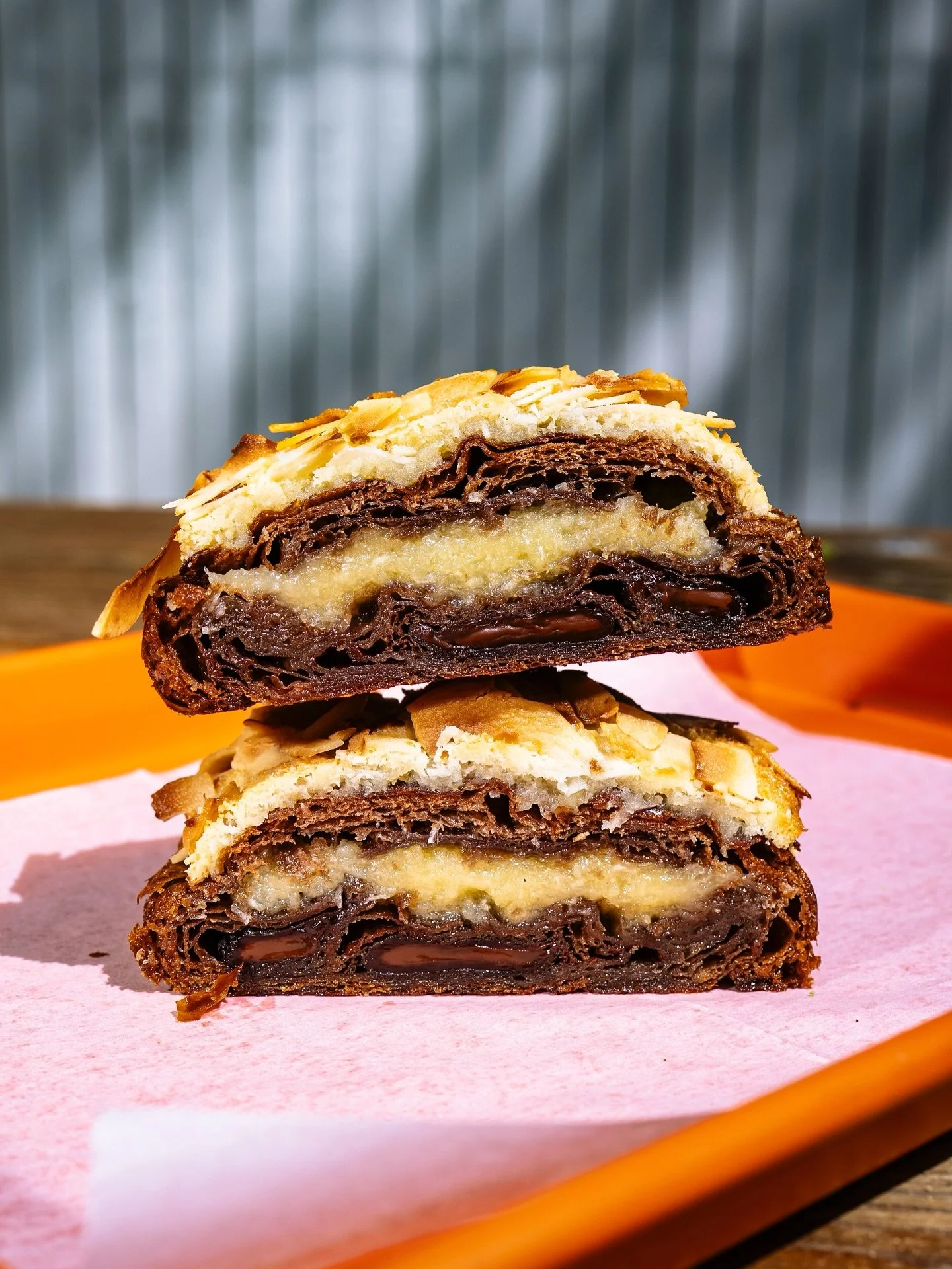 CHOCOLATE COCONUT ALMOND CROISSANT

Our triple chocolate croissant filled with vanilla syrup and coconut almond frangipane. 

Topped with big coconut pieces and baked until crunchy on the outside and gooey on the inside. 

Tastes the croissant versio