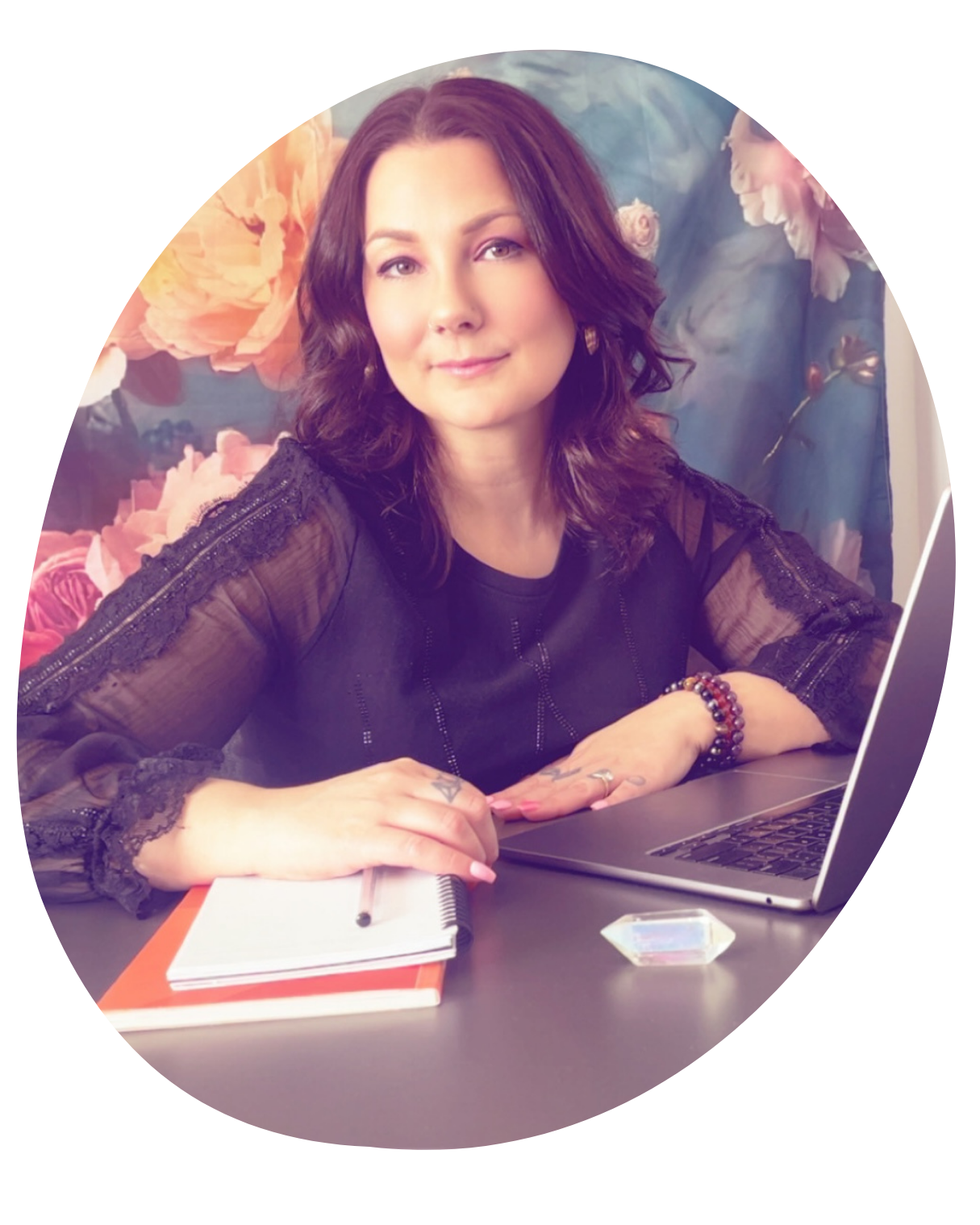 Jessica Deaken, web designer and optimization expert, working at her computer creating high-converting websites for Deaken Design Studio.