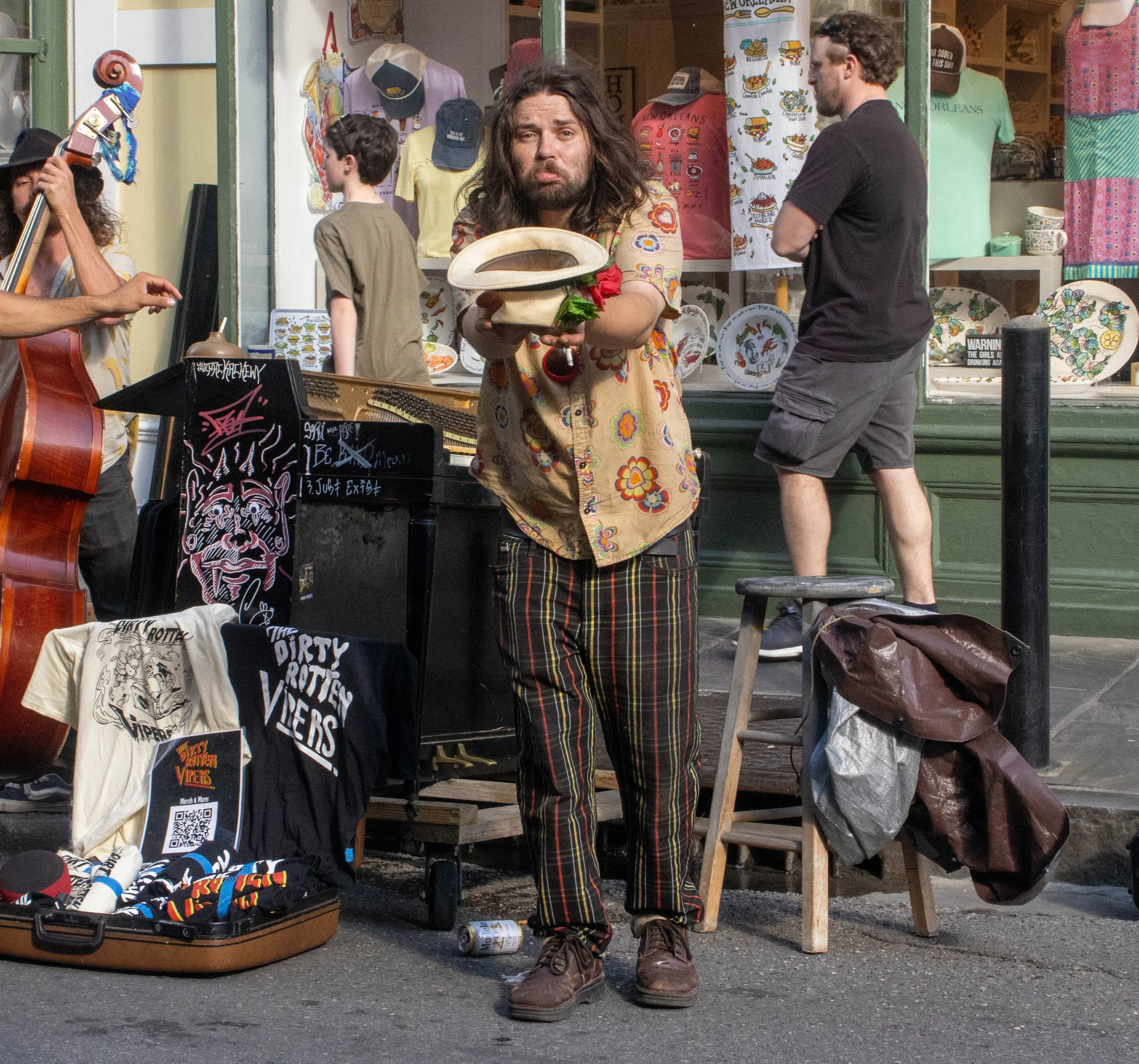 Will Harrington, the singer and piano player of The Dirty Rotten Viper Band, asks the audience for tips after his performance on Royal Street in the French Quarter in New Orleans, on Wednesday, April 1, 2026. Harrington was featured in the 2026 Oscar