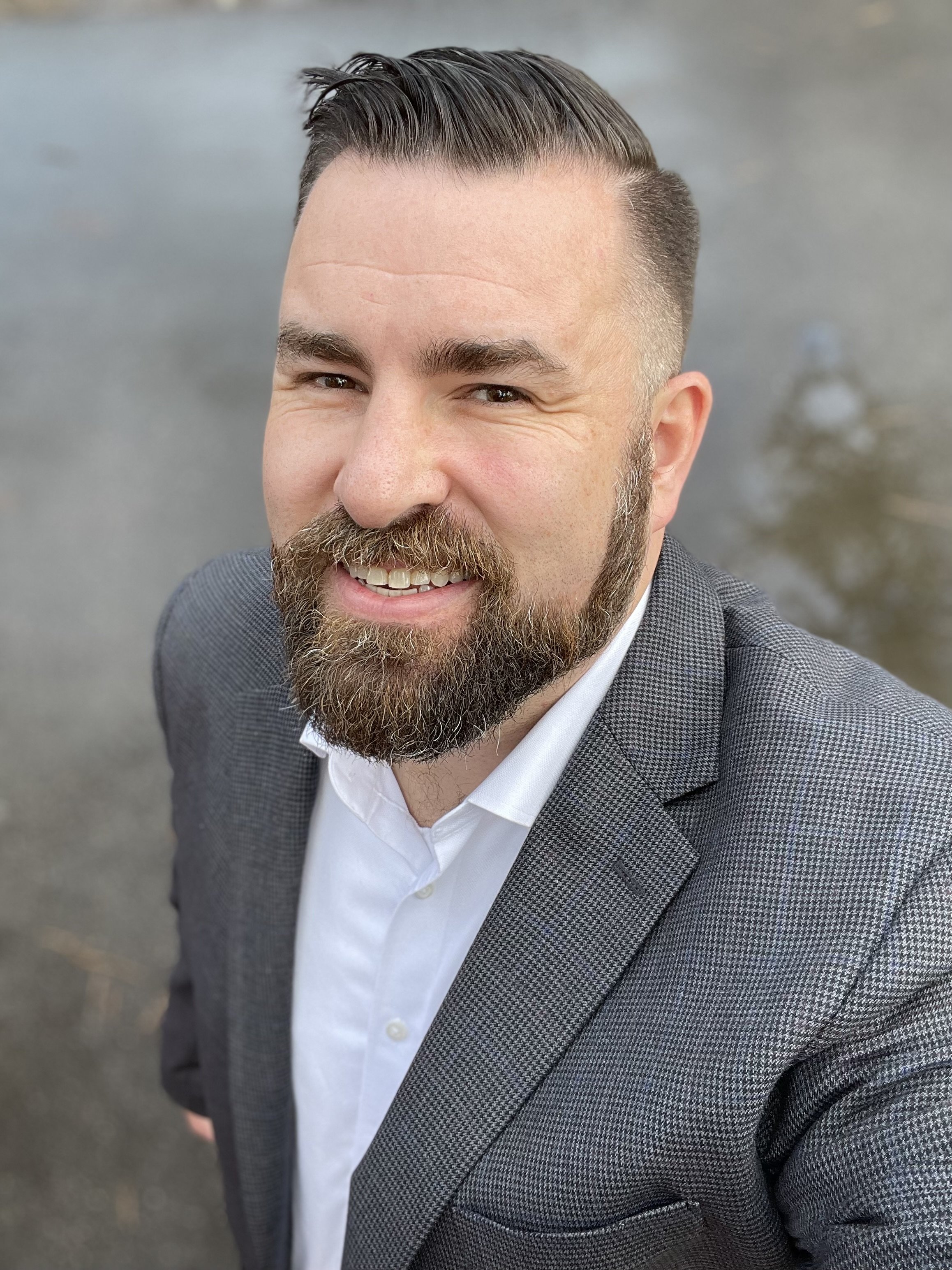 Graham Garner, a man in his 40s with brown hair and a distinctive beard