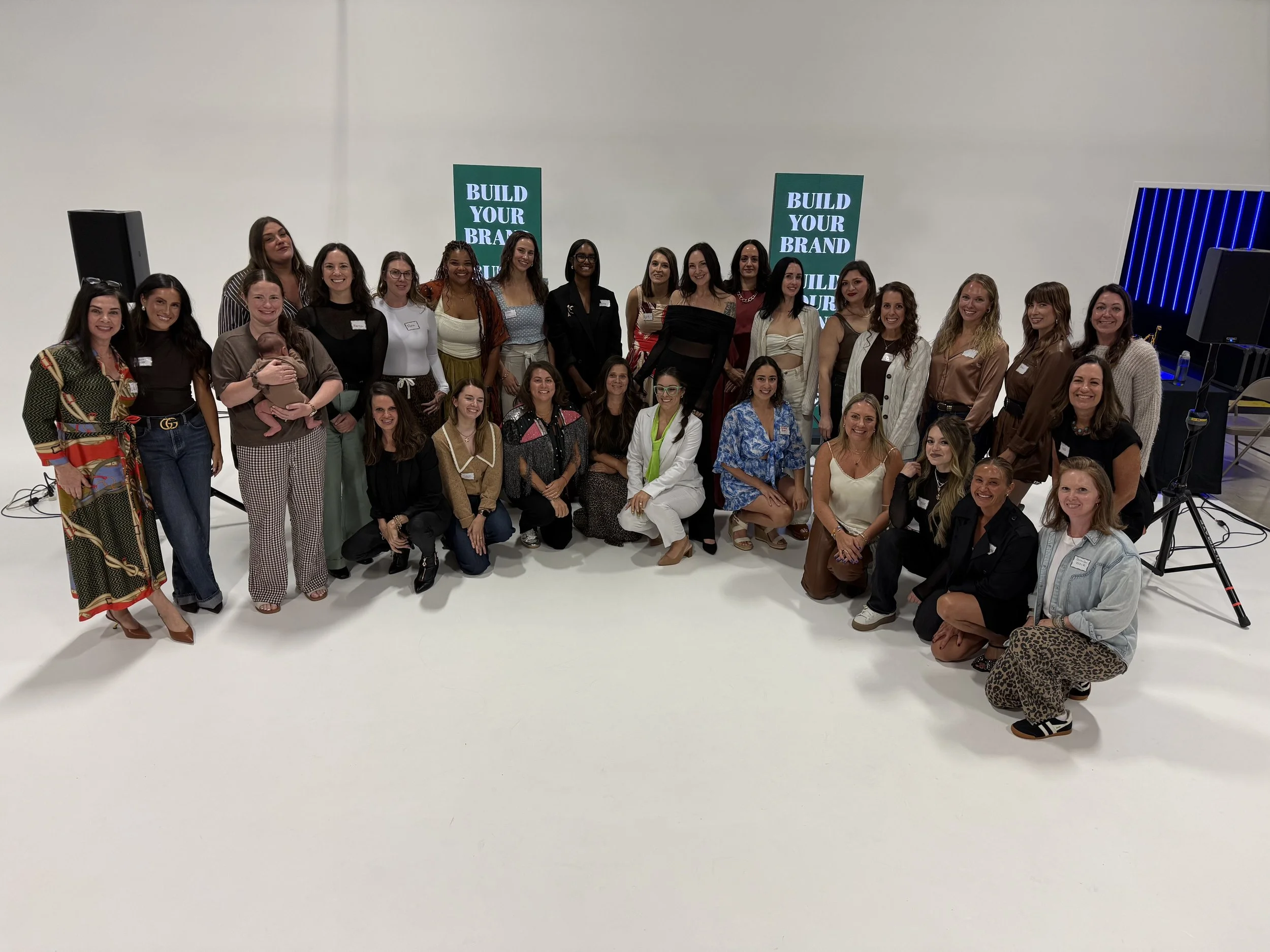 Women owned businesses get together to network and build a strong community along with a strong personal brand at Three Hive Studios