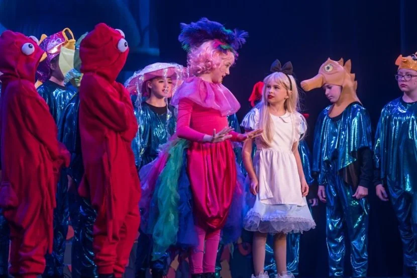 Kate Clowers as Dodo Bird in Alice in Wonderland Jr.
