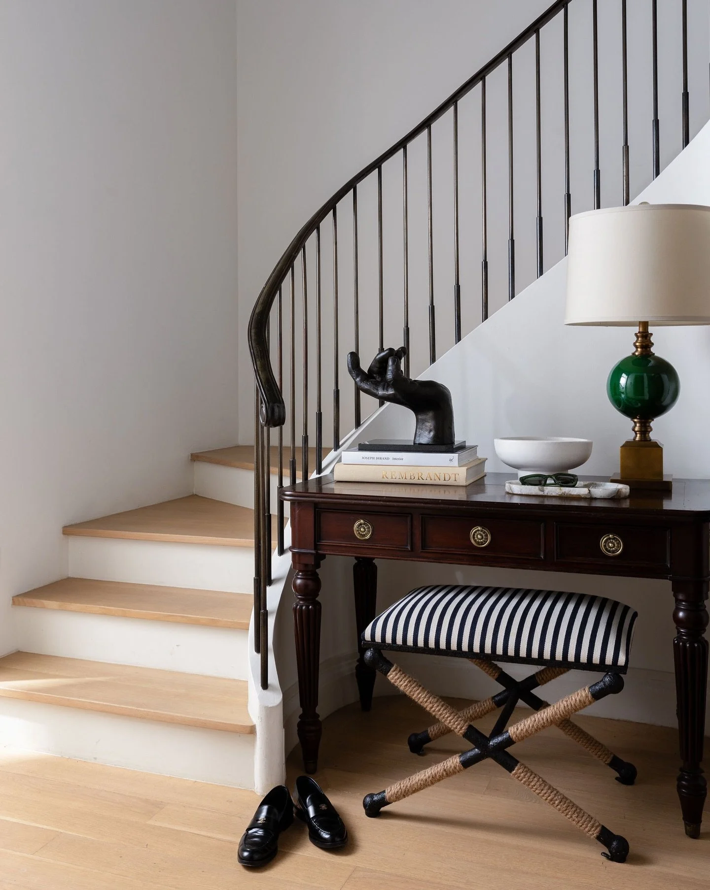 The entryway is the opening line of your home&rsquo;s story. This one begins with antiques and new finds, books and art. 

#LayeredLiving
#ArtForwardInteriors
#CollectedHome