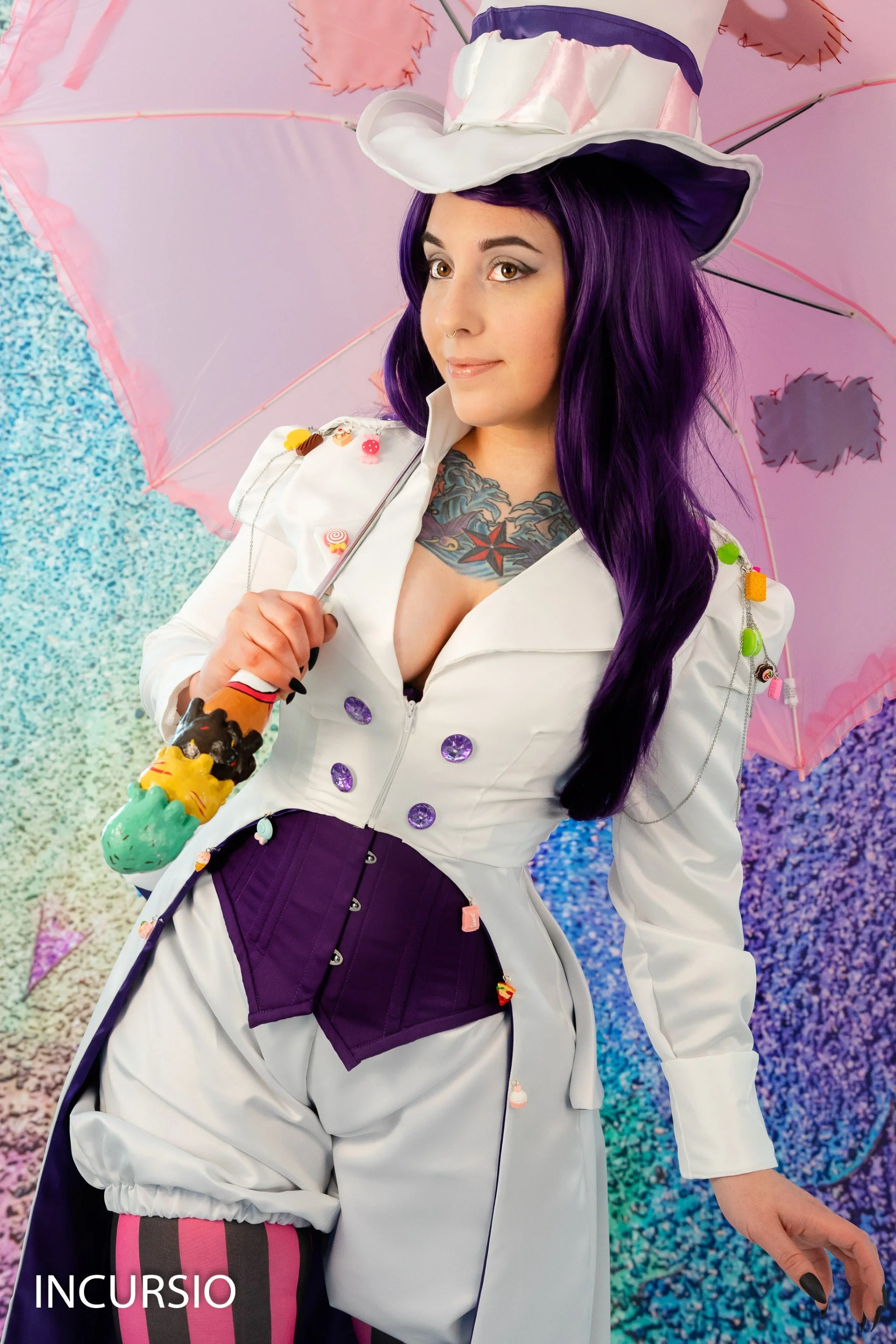 A woman with long purple hair wearing a white jacket decorated with colorful buttons, a purple pleated skirt, and pink striped leggings, holding a pink umbrella with a fluffy pink and purple animal design, standing in front of a background with multicolored sparkles.